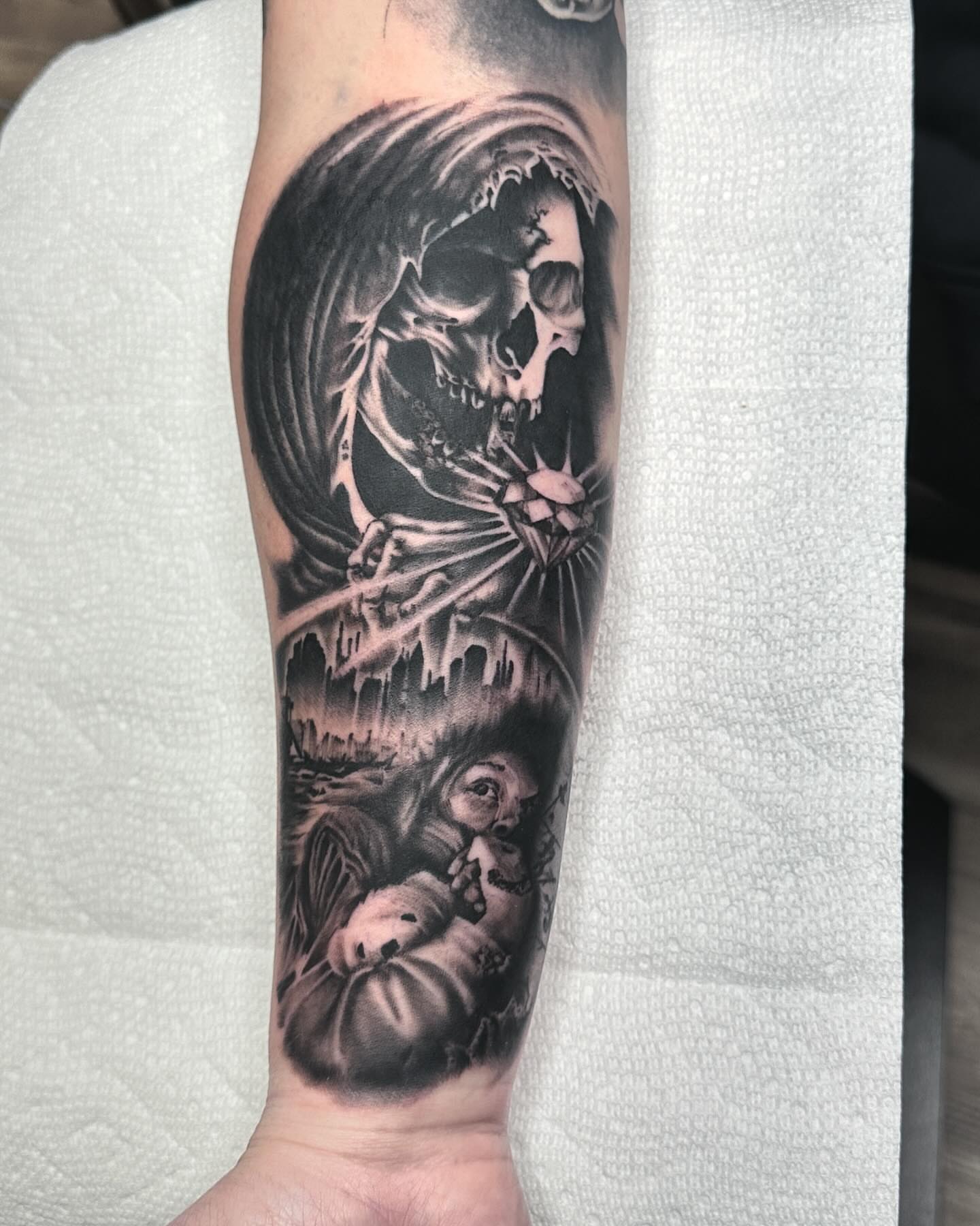 Grim reaper realism tattoo on the forearm by Douglas