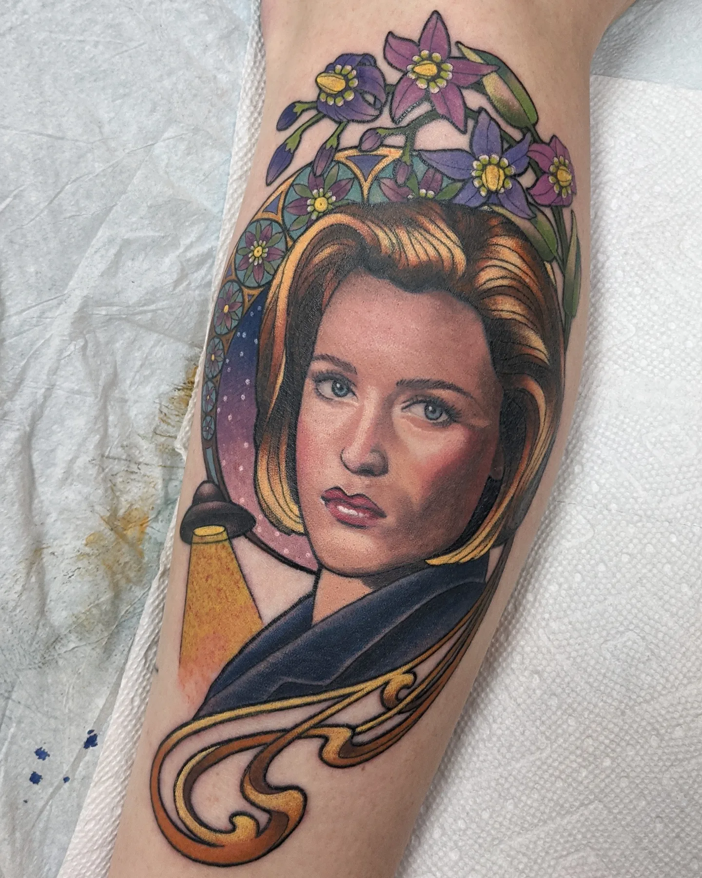 Portrait realism tattoo on the forearm by Christel Perkins