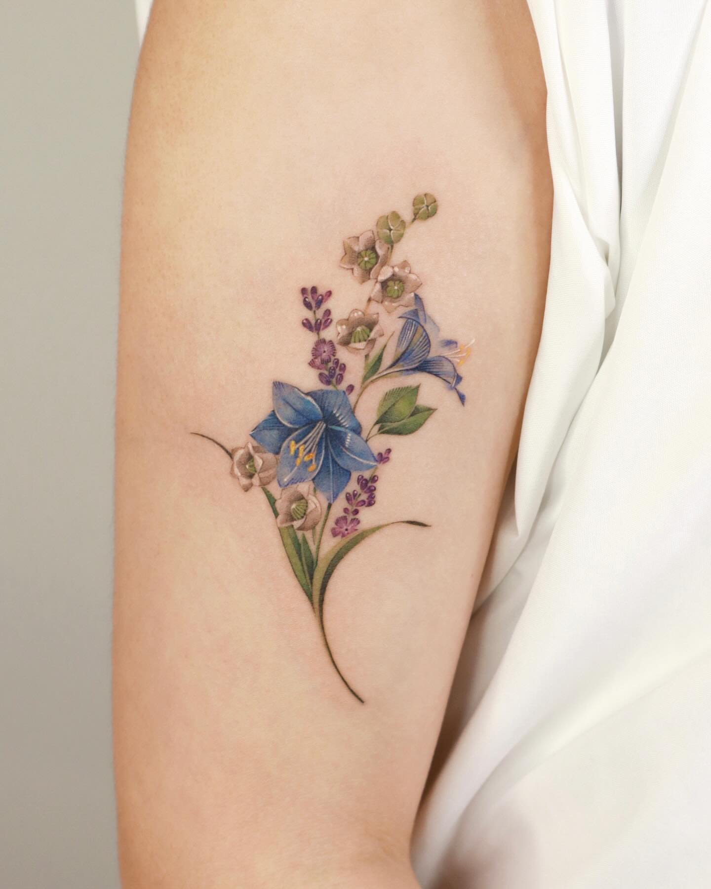 Tattoo by @sozil_tattoo — watercolor