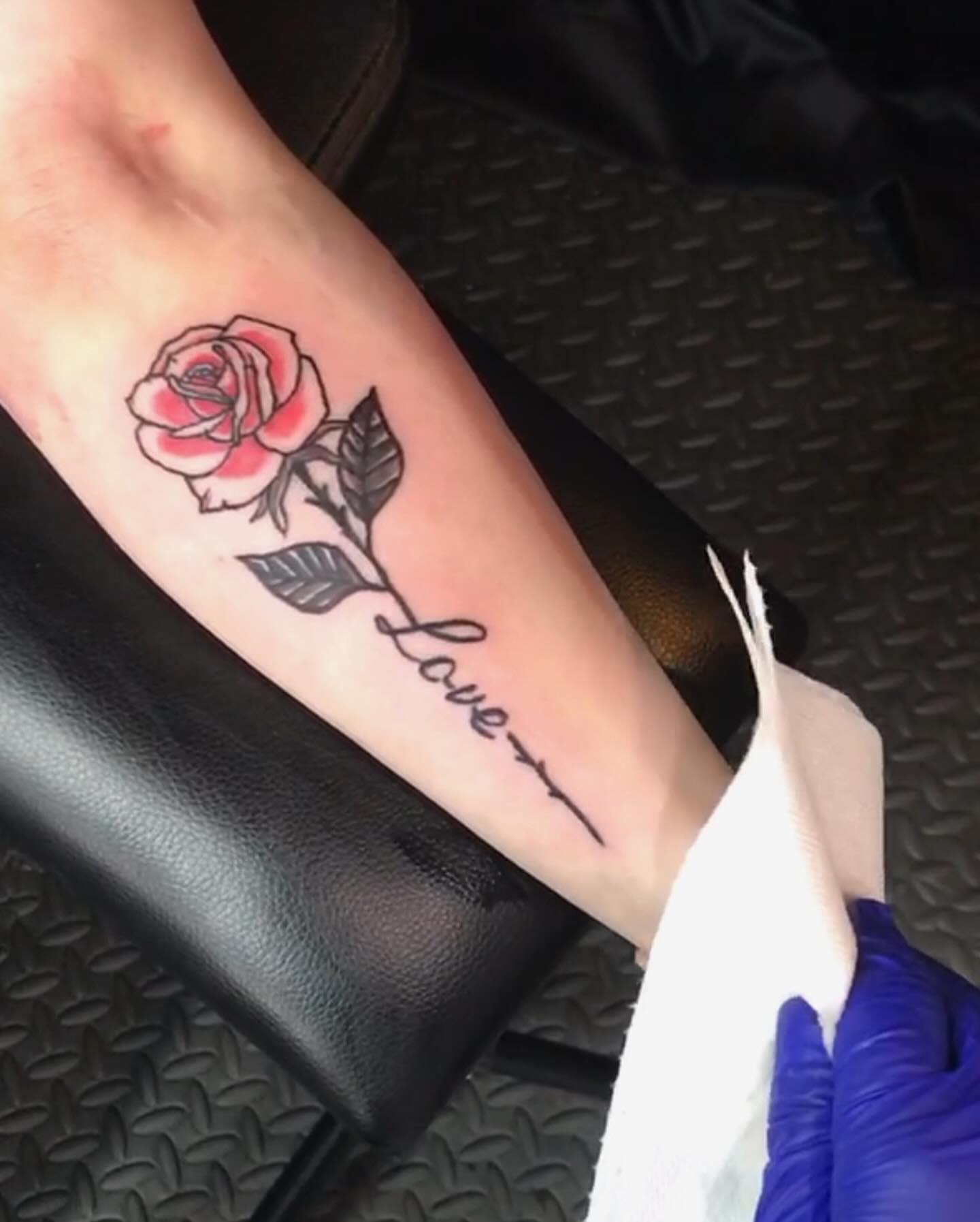 Rose American traditional tattoo on the forearm by Ride The Needle Tattoos, New Britain, Connecticut