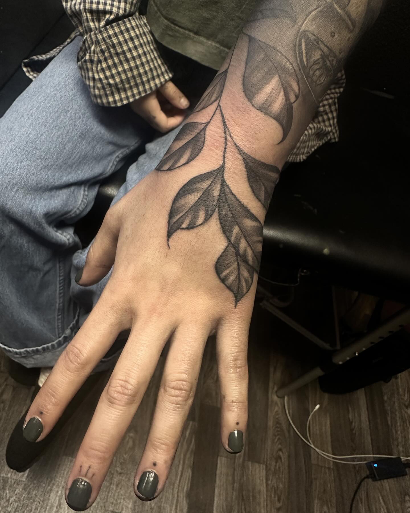 Leaf black and grey tattoo on the forearm by Tattoosxjoseph
