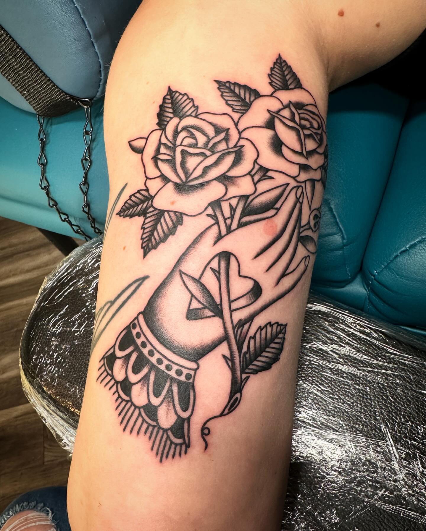 Roses and hand black and grey tattoo on the forearm by Jess Ritchie, Austin, Texas