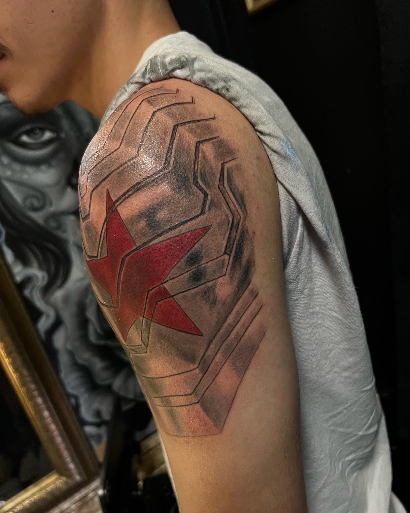 Red star on armor realism tattoo on the shoulder by JT Ink