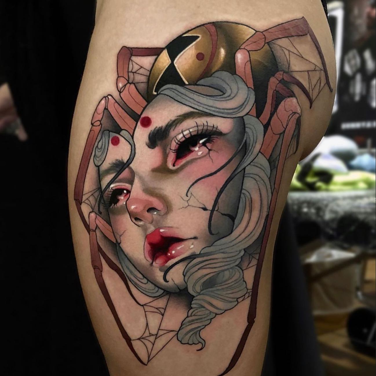 Woman's face realism tattoo on the thigh by Levi Murphy