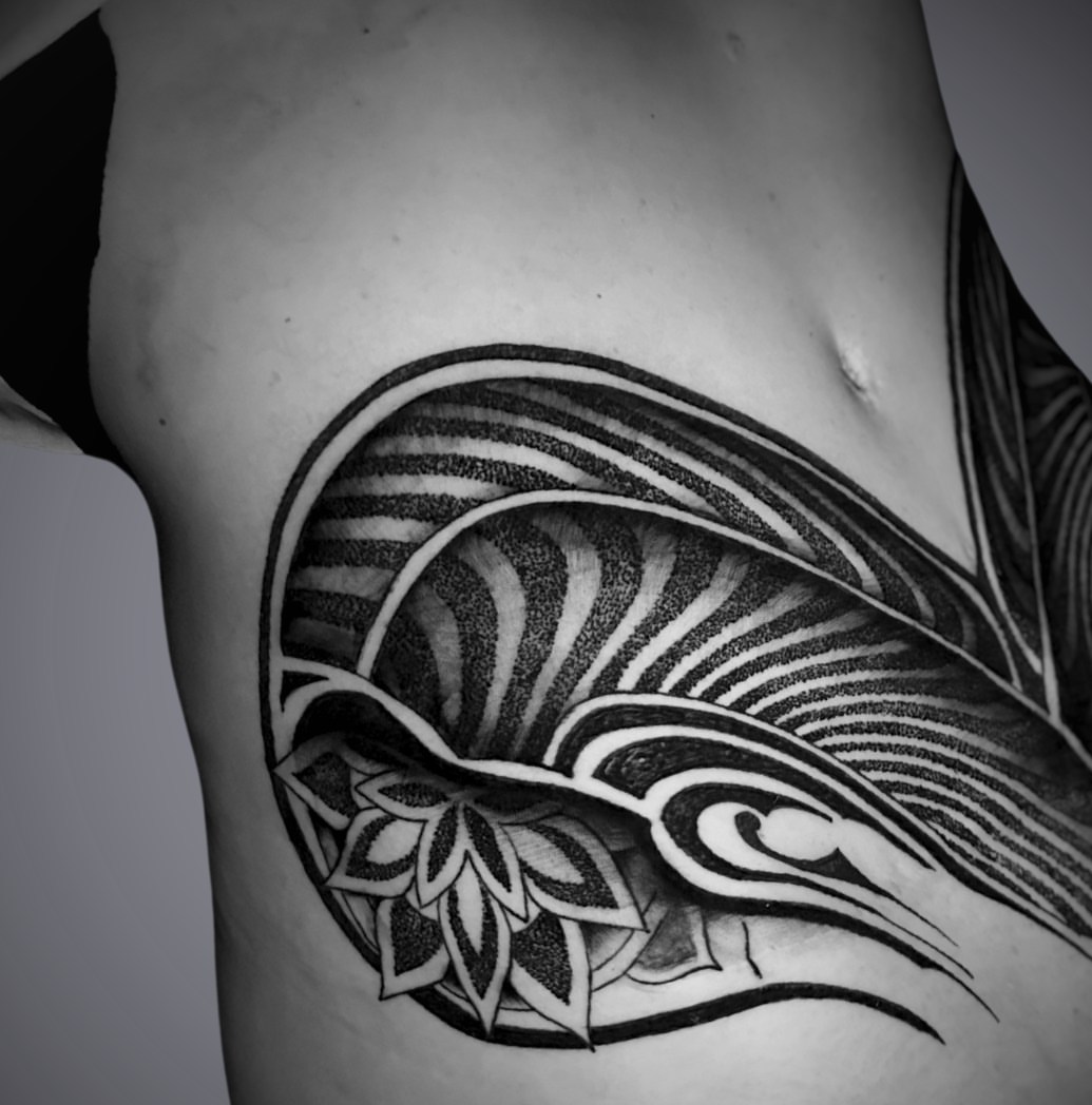Tattoo by @jordanrookustattoo — dotwork, tribal