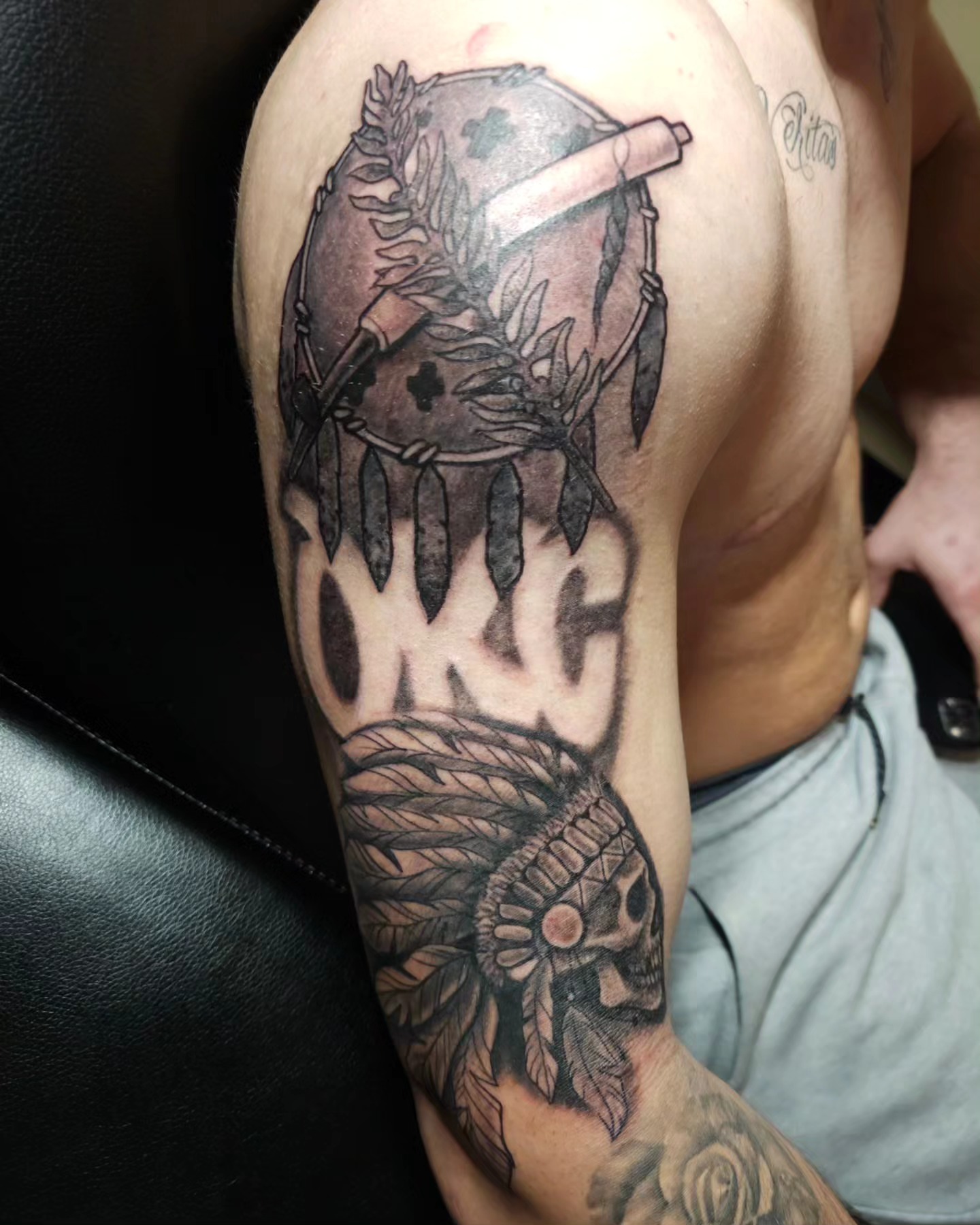 Skull headdress American traditional tattoo on the forearm by Germaine Sherman