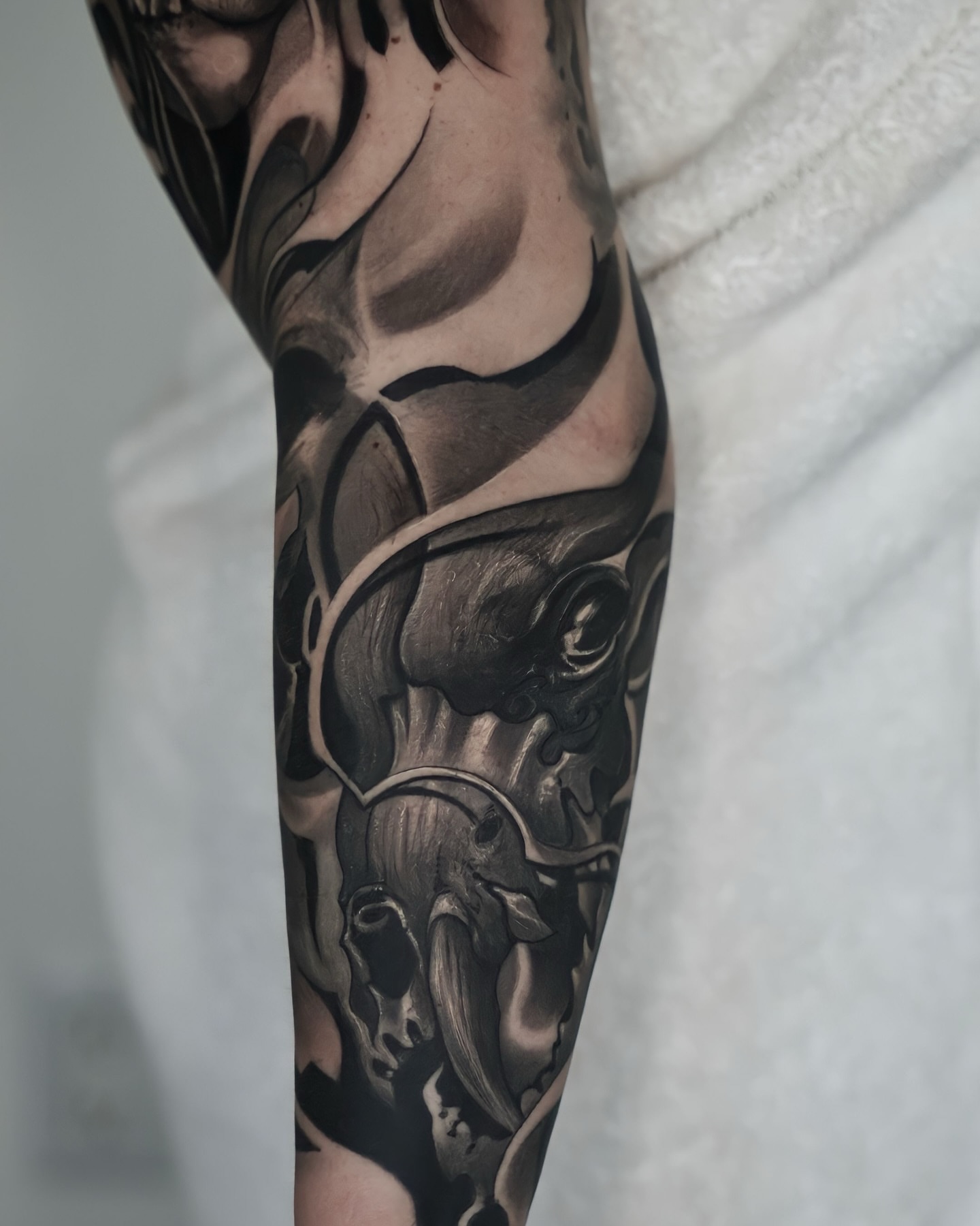 Tattoo by @schrail_edmund — black_and_grey, dark_realism