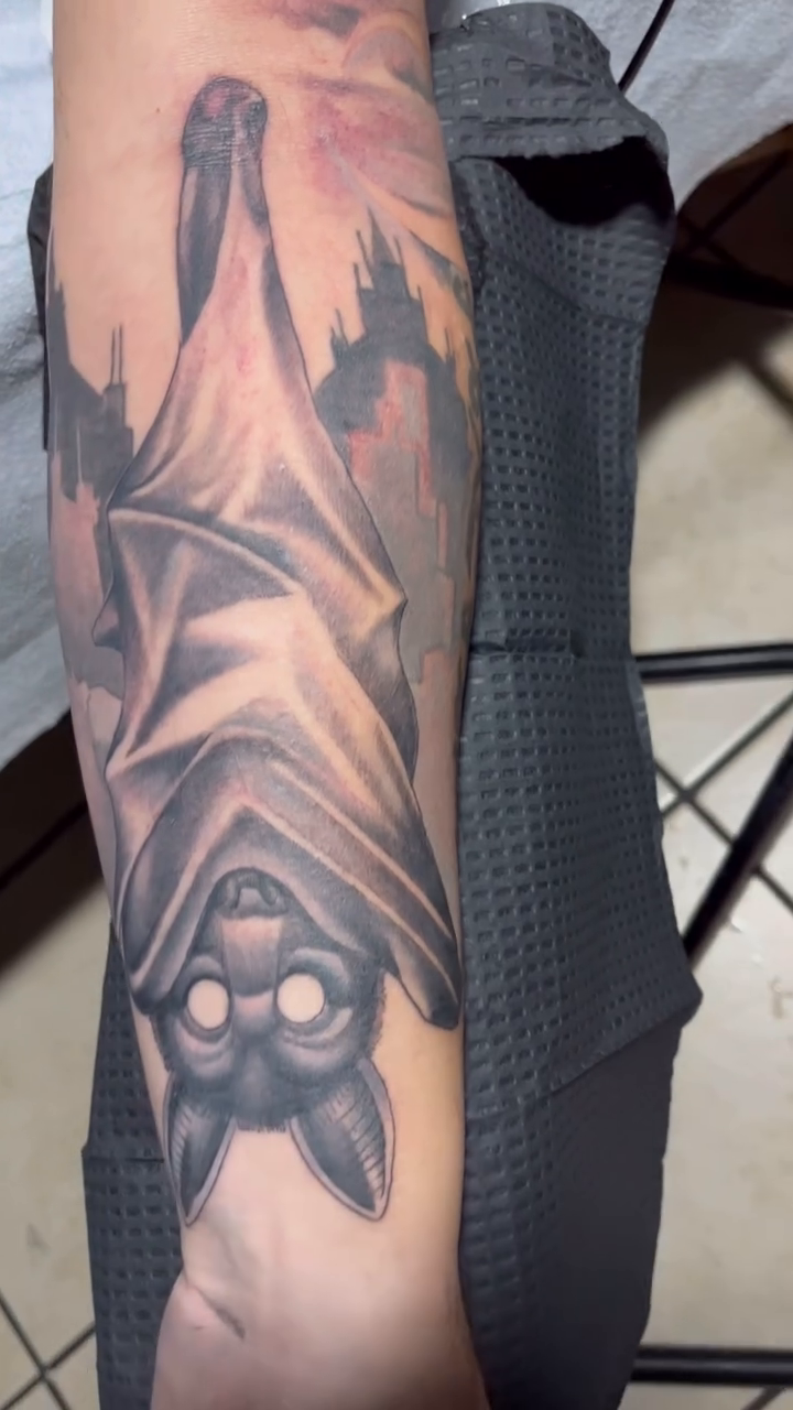Bat hanging upside down dark realism tattoo by Look