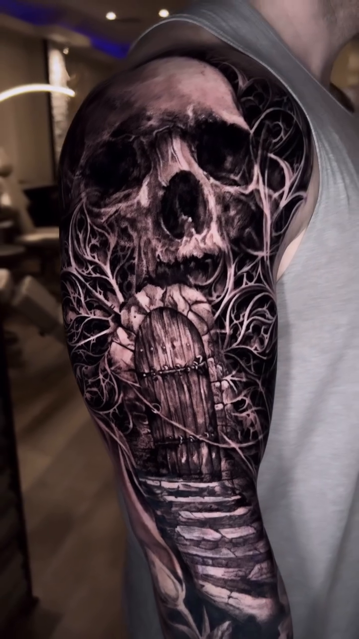 Skull with a door and stairs dark realism tattoo by Armando Galán 🇨🇱🇺🇸