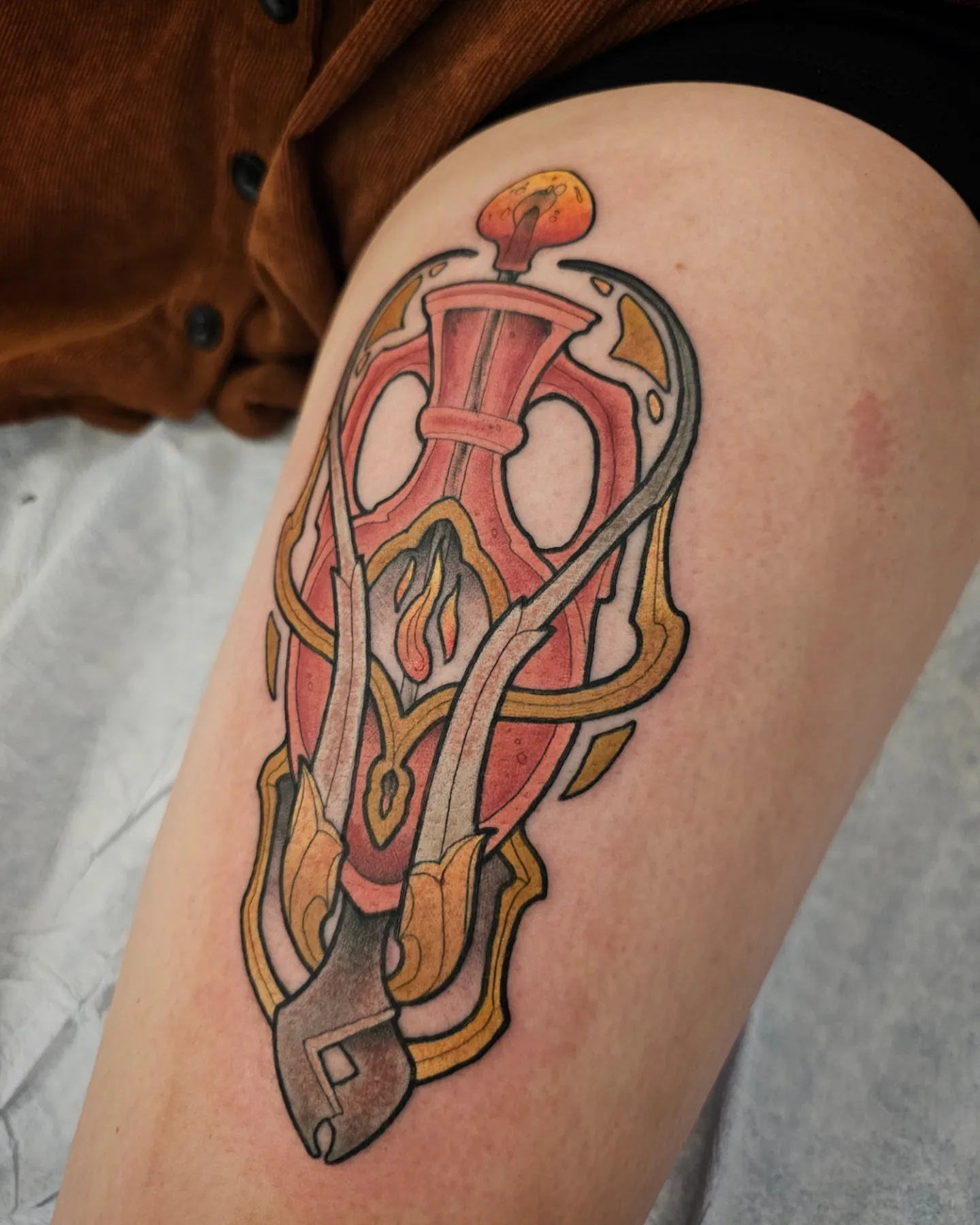 Gun and flame geometric tattoo on the thigh by Robert Kraiza - Philadelphia Tattoo Artist