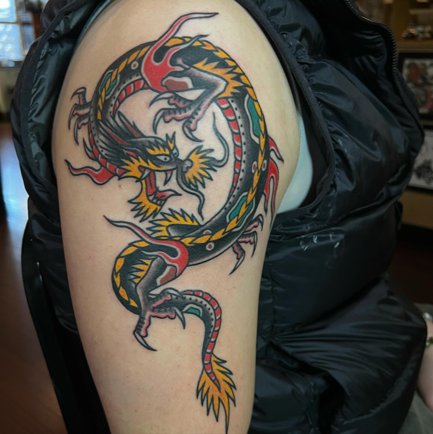 Dragon American traditional tattoo on the shoulder by Ross K. Jones Tattoos, San Francisco, California