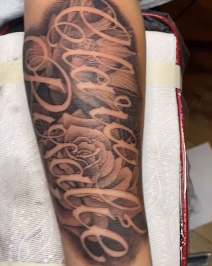 Family lettering script tattoo by ๐ญ๐๐ ๐ฎ๐๐๐๐๐, Berkeley, California