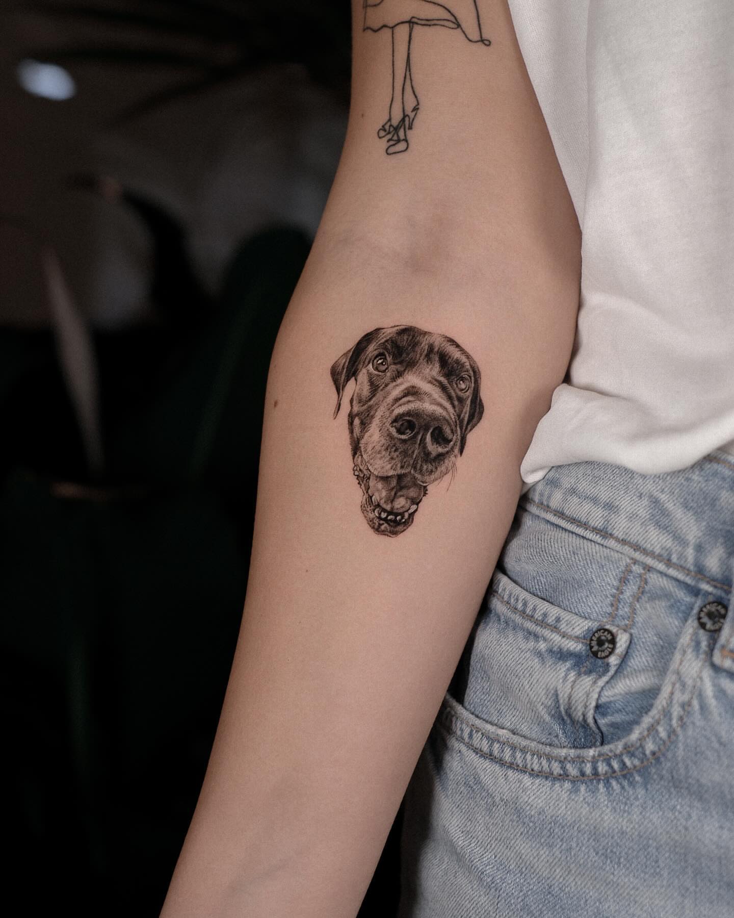 Dog head realism tattoo on the forearm by Kate