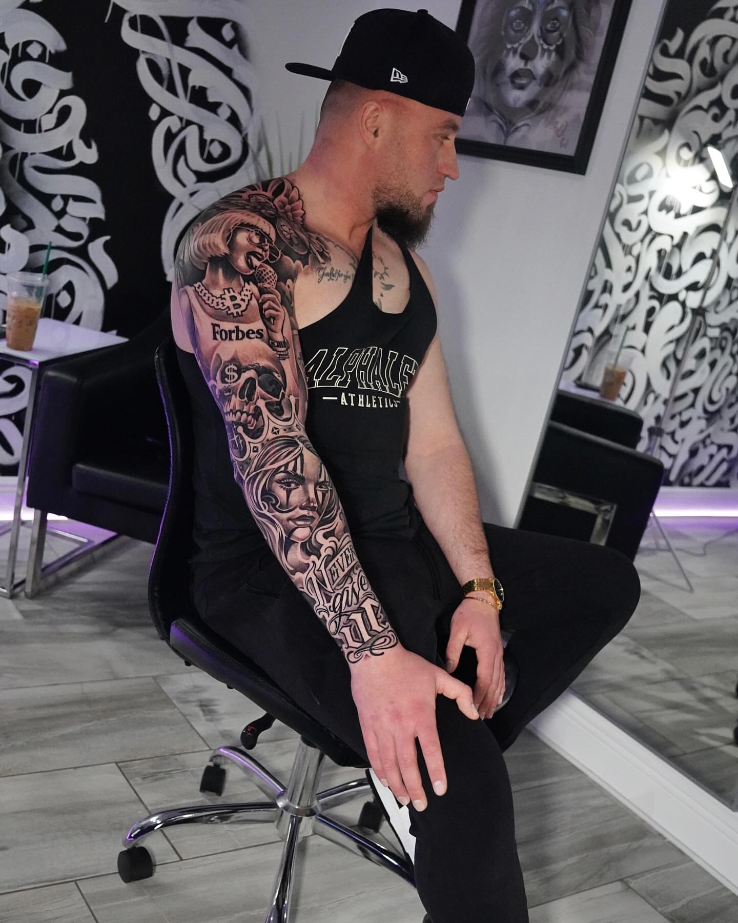 Portrait American traditional tattoo on the upper arm by Artem Kunakuzin