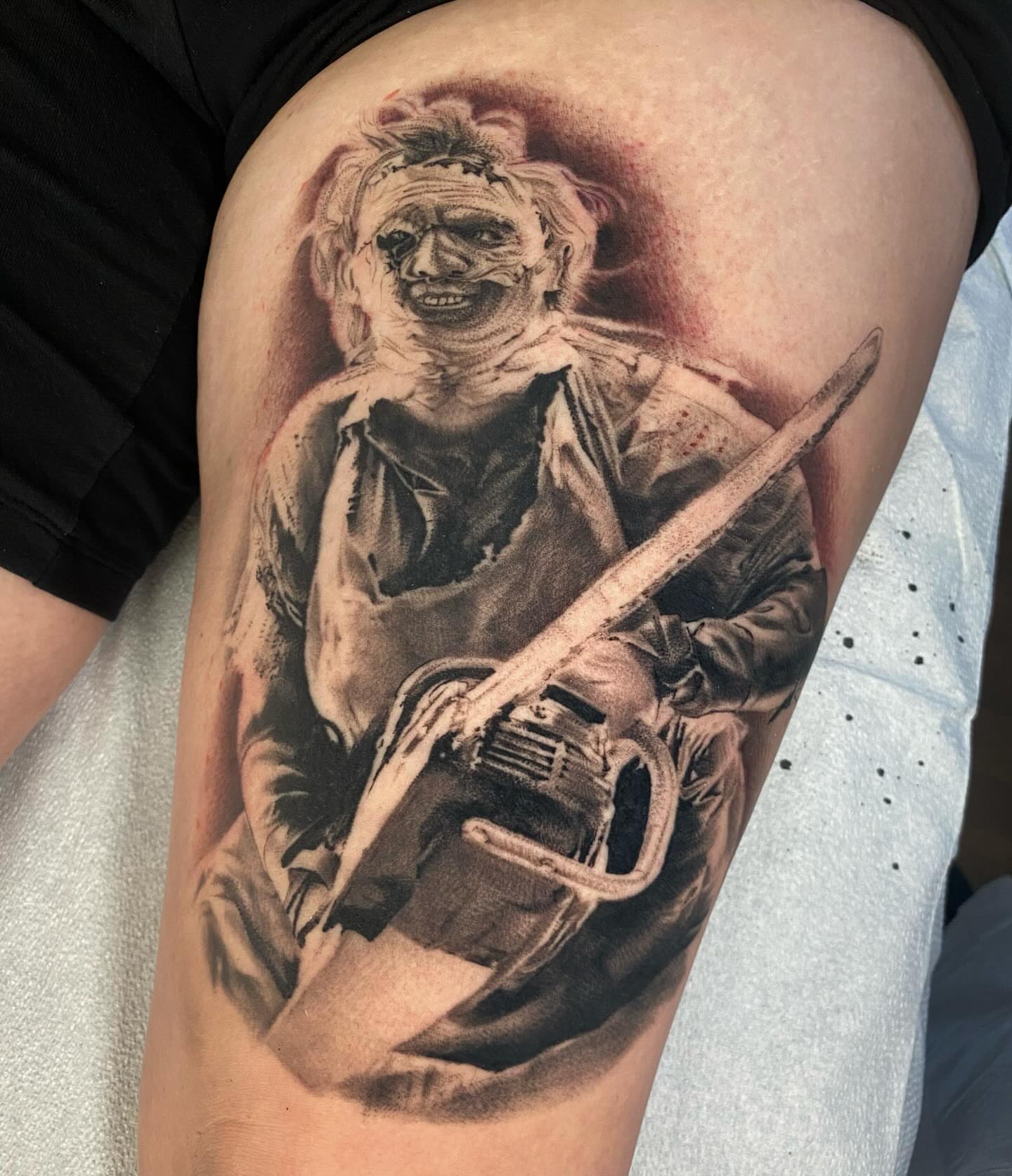 Chainsaw killer realism tattoo on the thigh by D Benzo ~ San Diego Tattoo artist ~