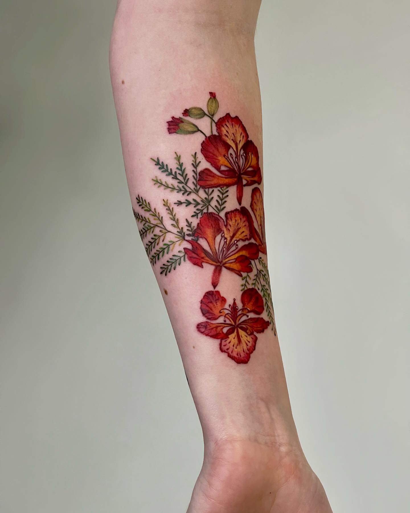 Flowers realism tattoo on the forearm by Seattle Tattoo Artist PingPing, Seattle, Washington