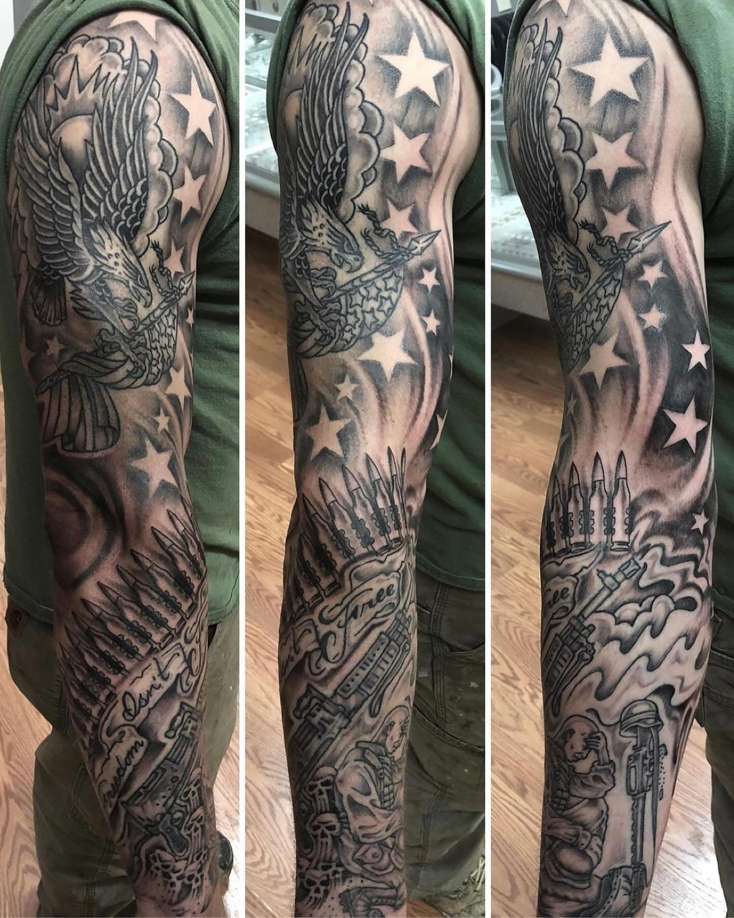 American eagle and stars American traditional tattoo on the upper arm by Strange Brew Tattoo