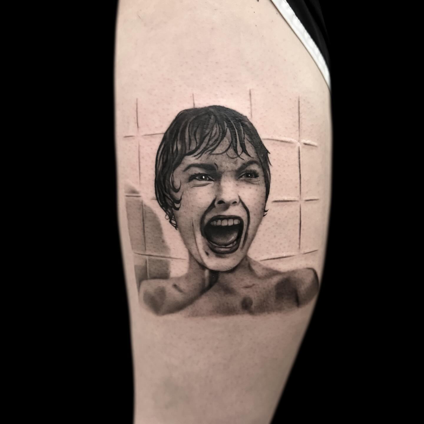 Shower scene realism tattoo on the forearm by Jen Bean, Richmond, Virginia