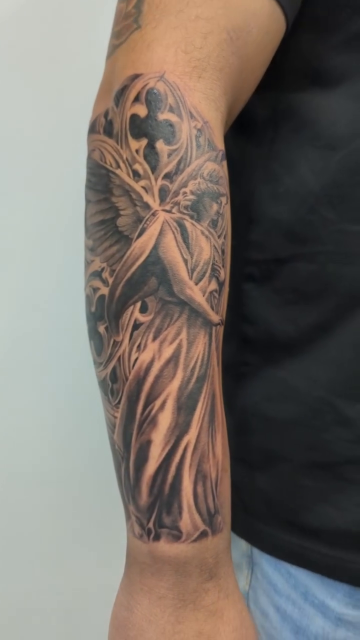 Angel realism tattoo by Sean Costello