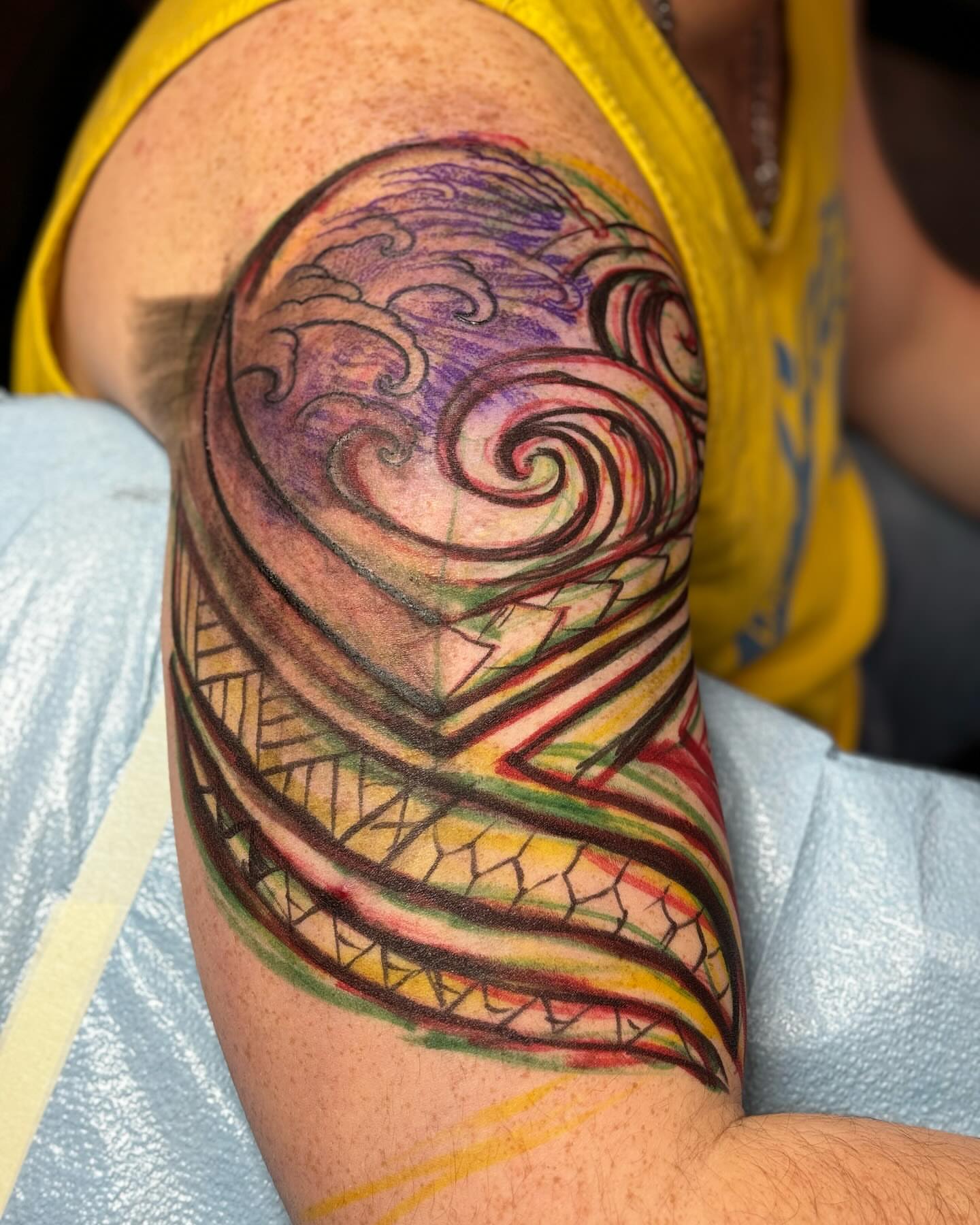 Wave and lightning geometric tattoo on the forearm by Alejandro Zaragoza