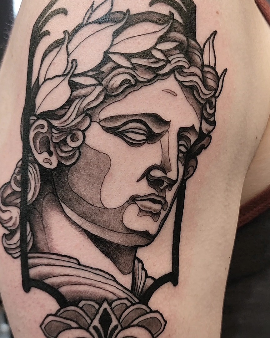 Statue head black and grey tattoo on the forearm by Mario Romero
