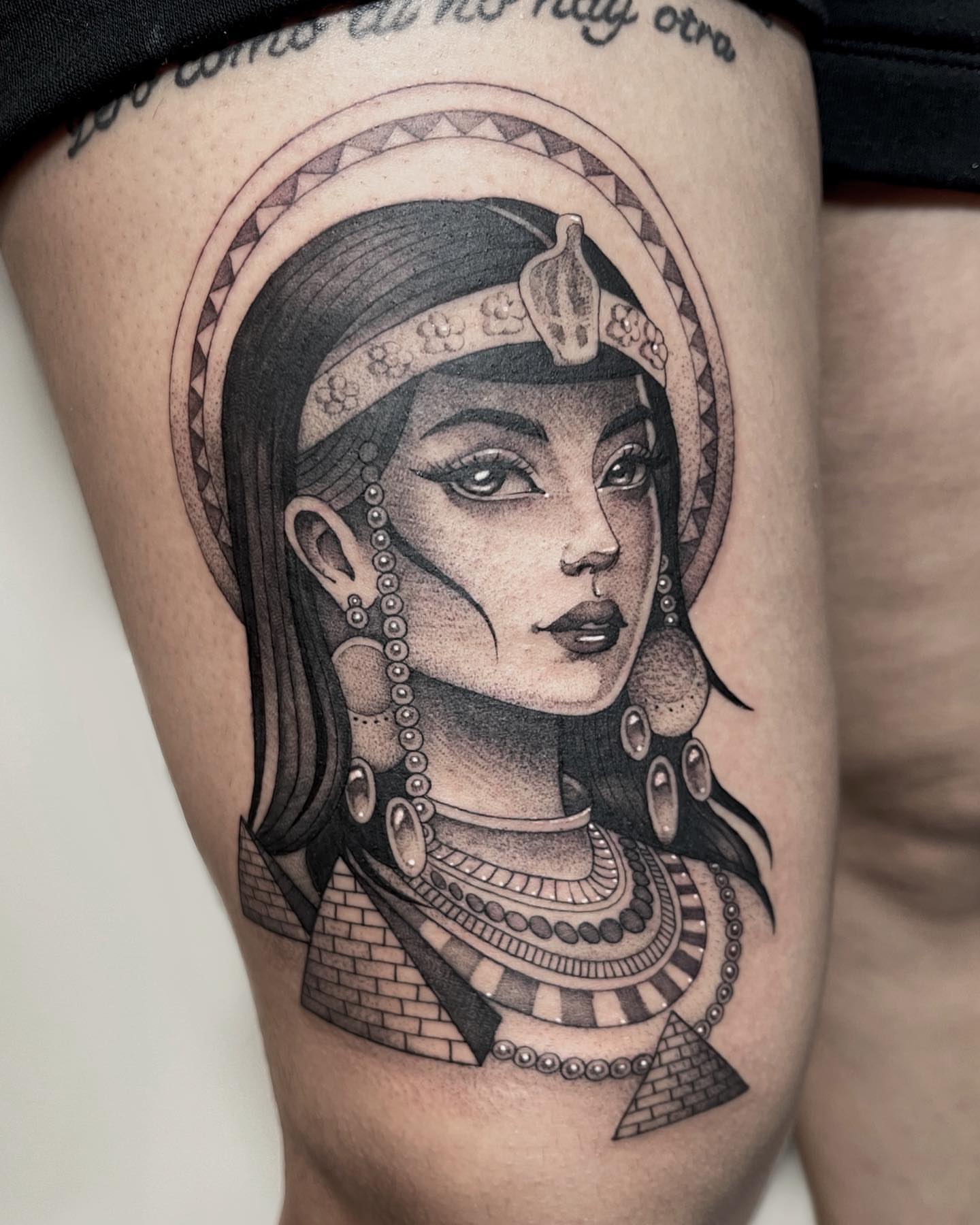 Egyptian woman realism tattoo on the thigh by Kelsi Steffensen