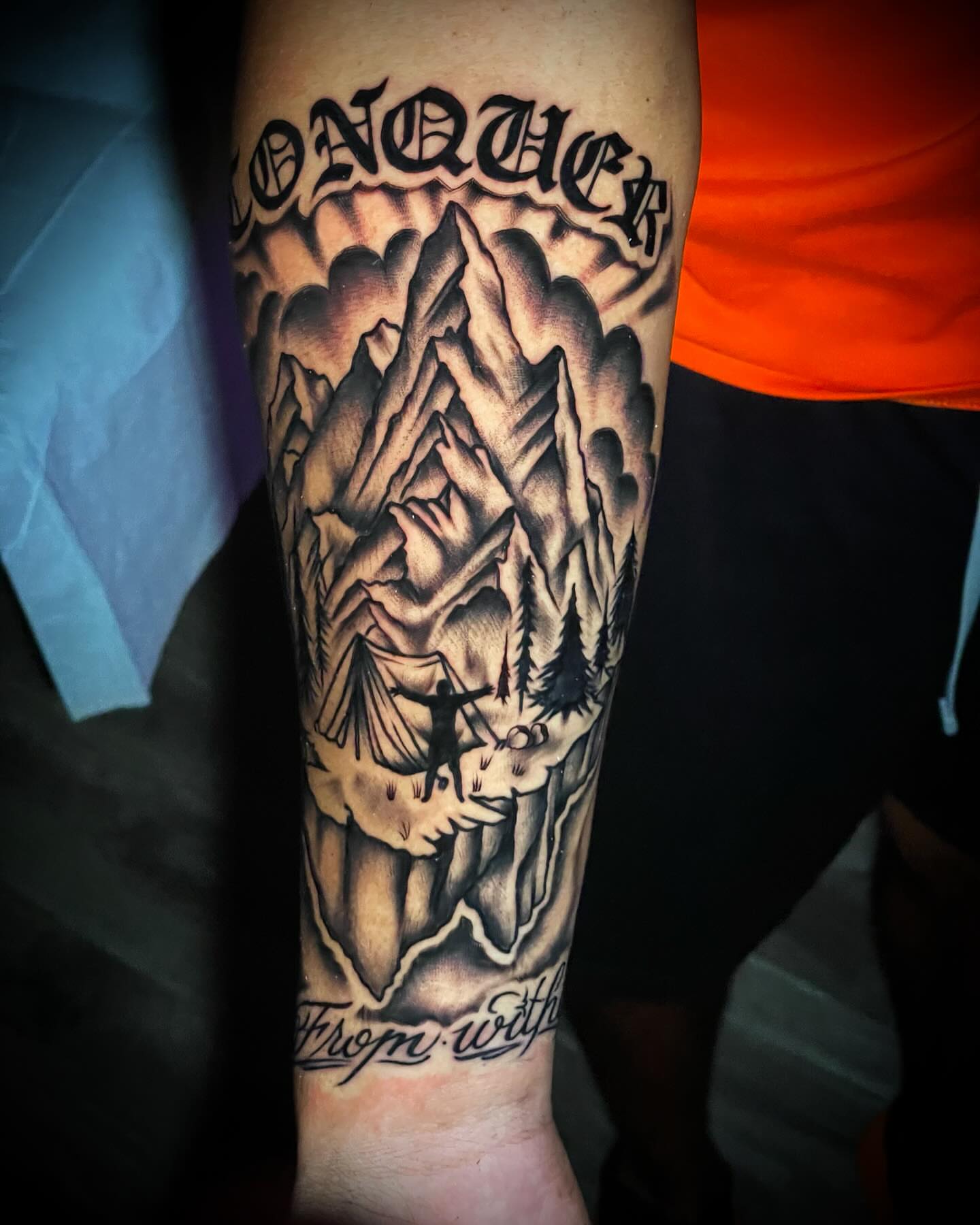 Mountain landscape realism tattoo on the forearm by Alex Muniz