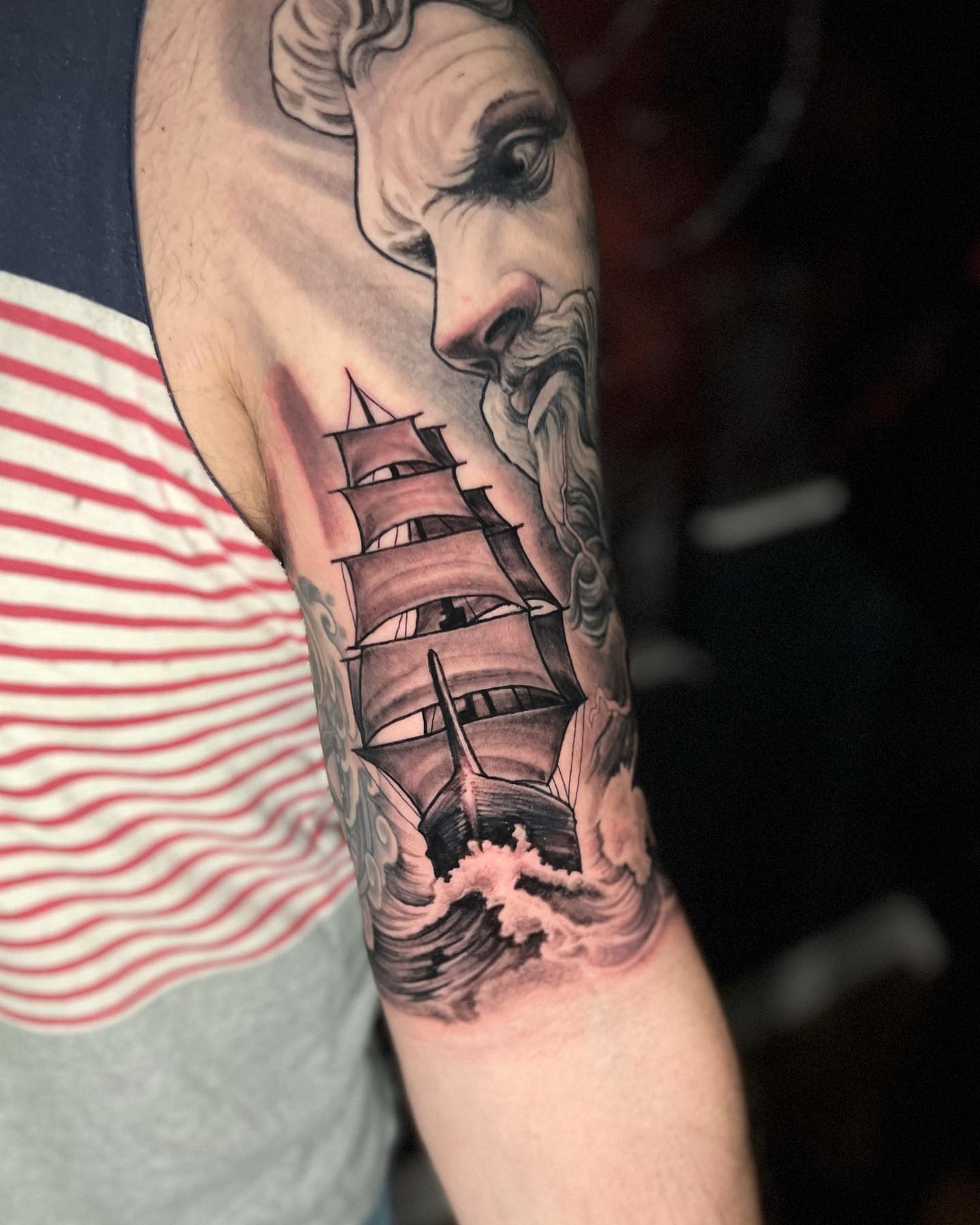 Ship and sailor realism tattoo on the forearm by Tucker, Maryville, Tennessee