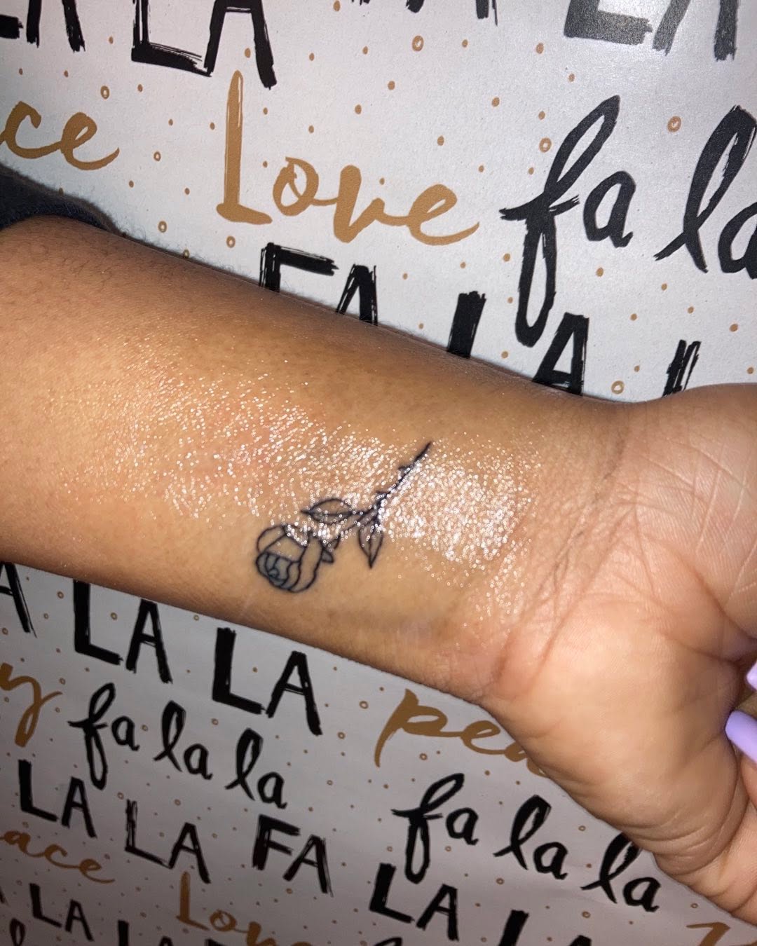 Rose tattoo on the forearm by CmoreInk