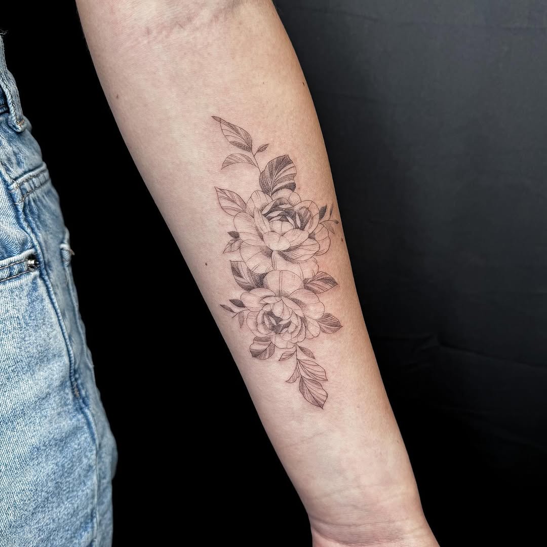 Floral arrangement fine line tattoo on the forearm by INK by CEE