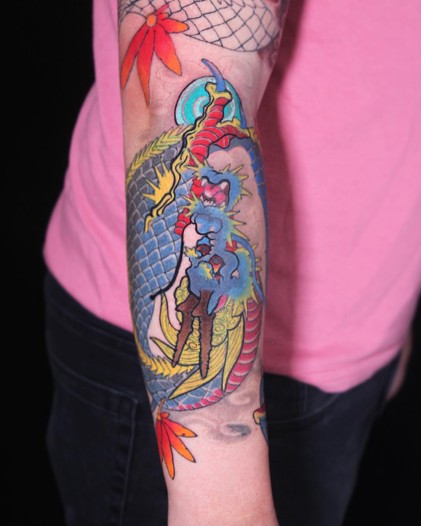 Dragon American traditional tattoo on the forearm by Alezumie