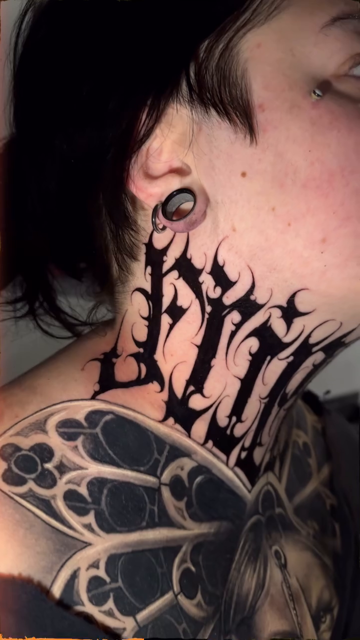 Gothic lettering with ornamental background blackwork tattoo by Atlanta Tattoo Artist, Atlanta, Georgia