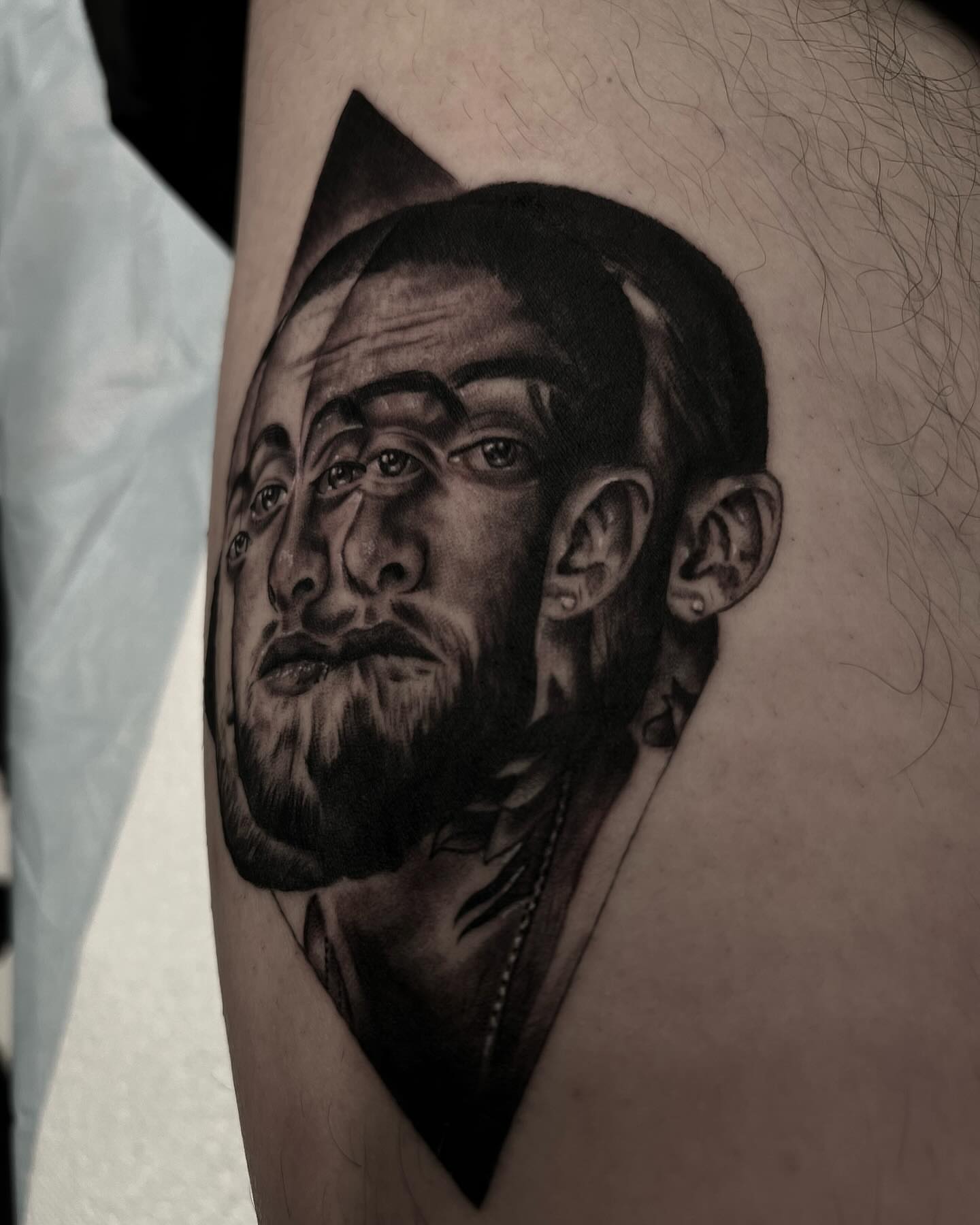 Portrait realism tattoo on the forearm by Sebastian Calderon