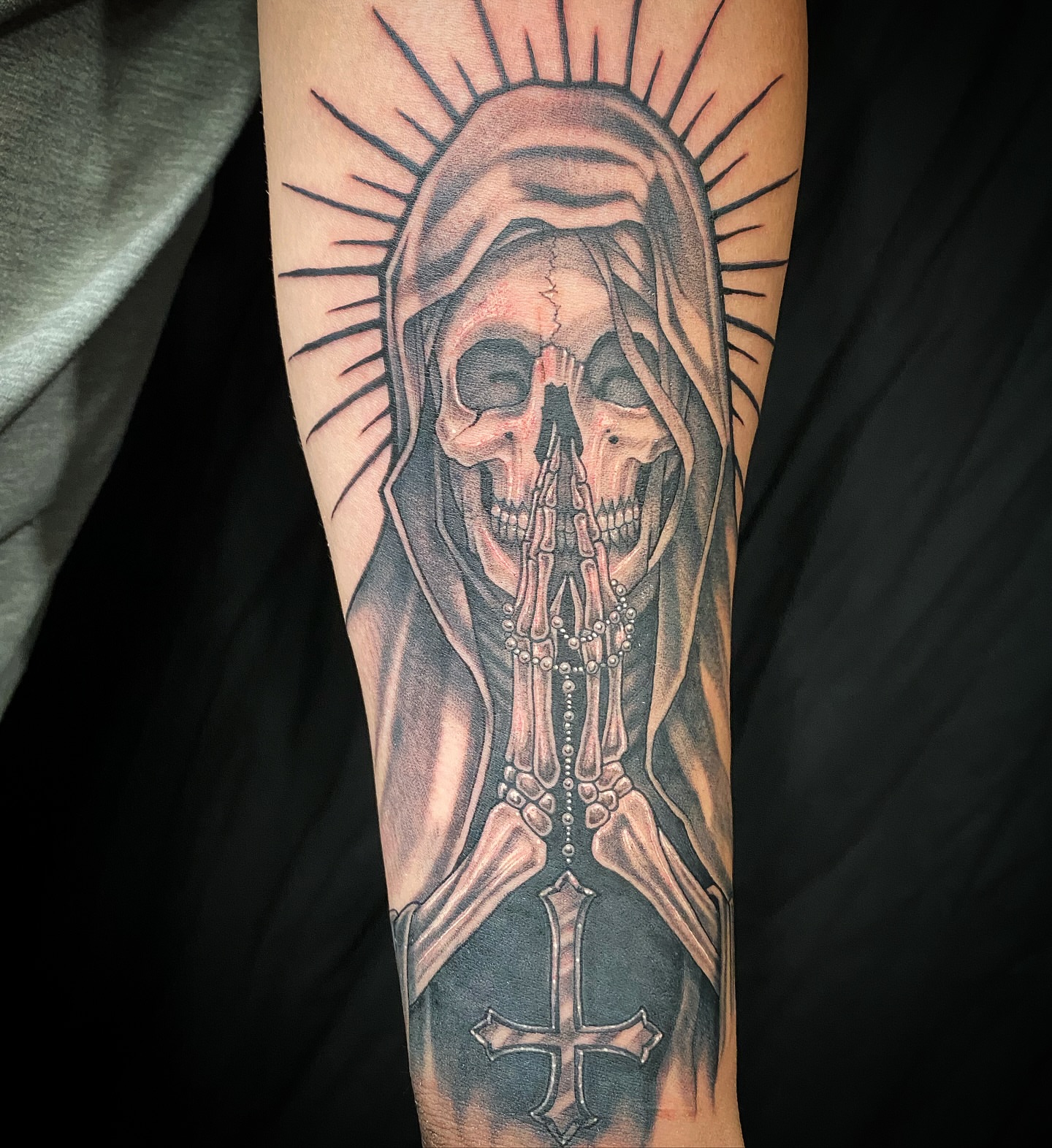 Skeleton praying realism tattoo on the forearm by El Pato, San Jose, California