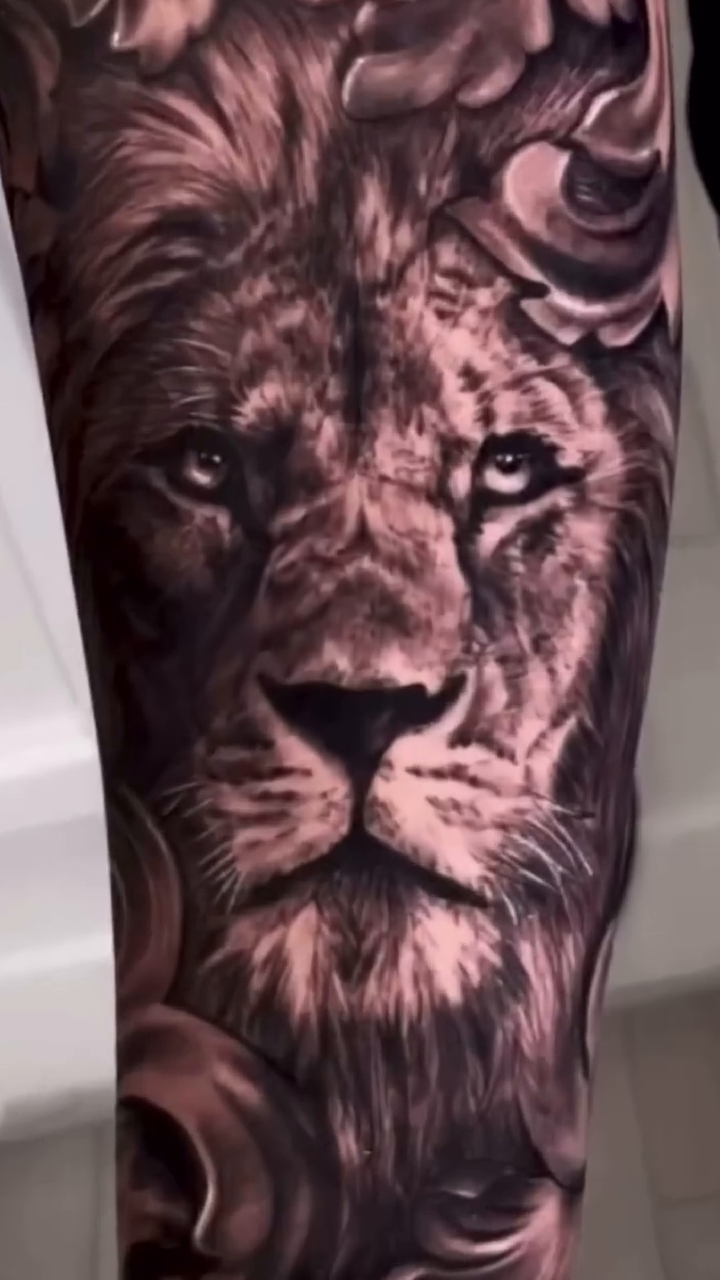 Lion portrait realism tattoo by Keebs