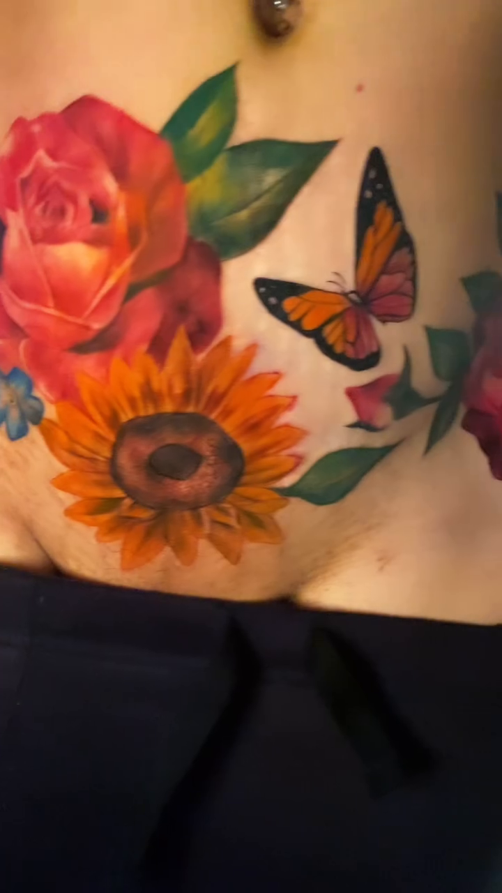 Flowers and butterflies realism tattoo by Tattoo Artist