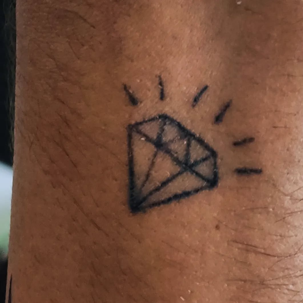 Diamond tattoo on the forearm by Tatuadora & Piercer