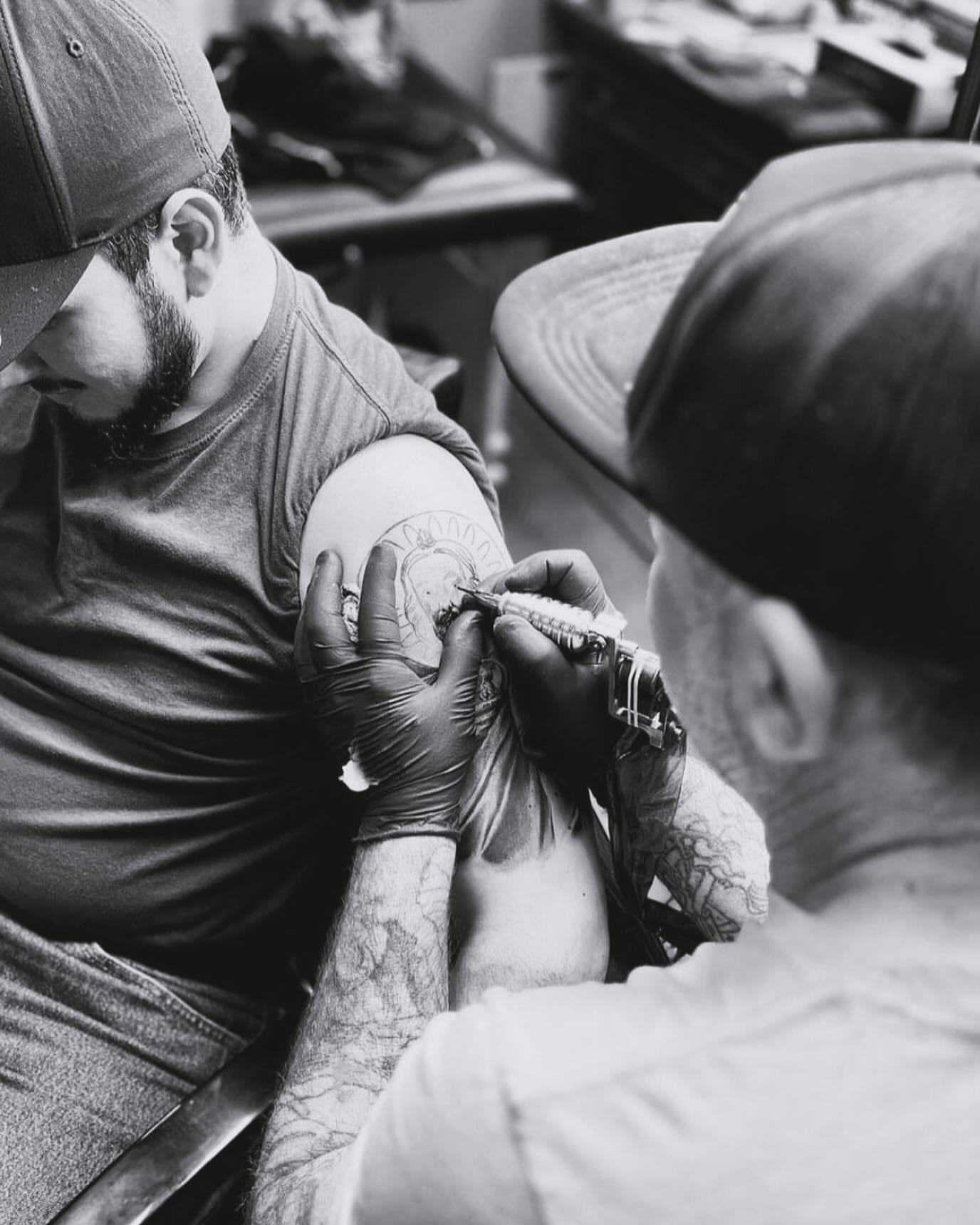 Tattoo artist black and grey tattoo on the upper arm by 💀good To the Grave💀