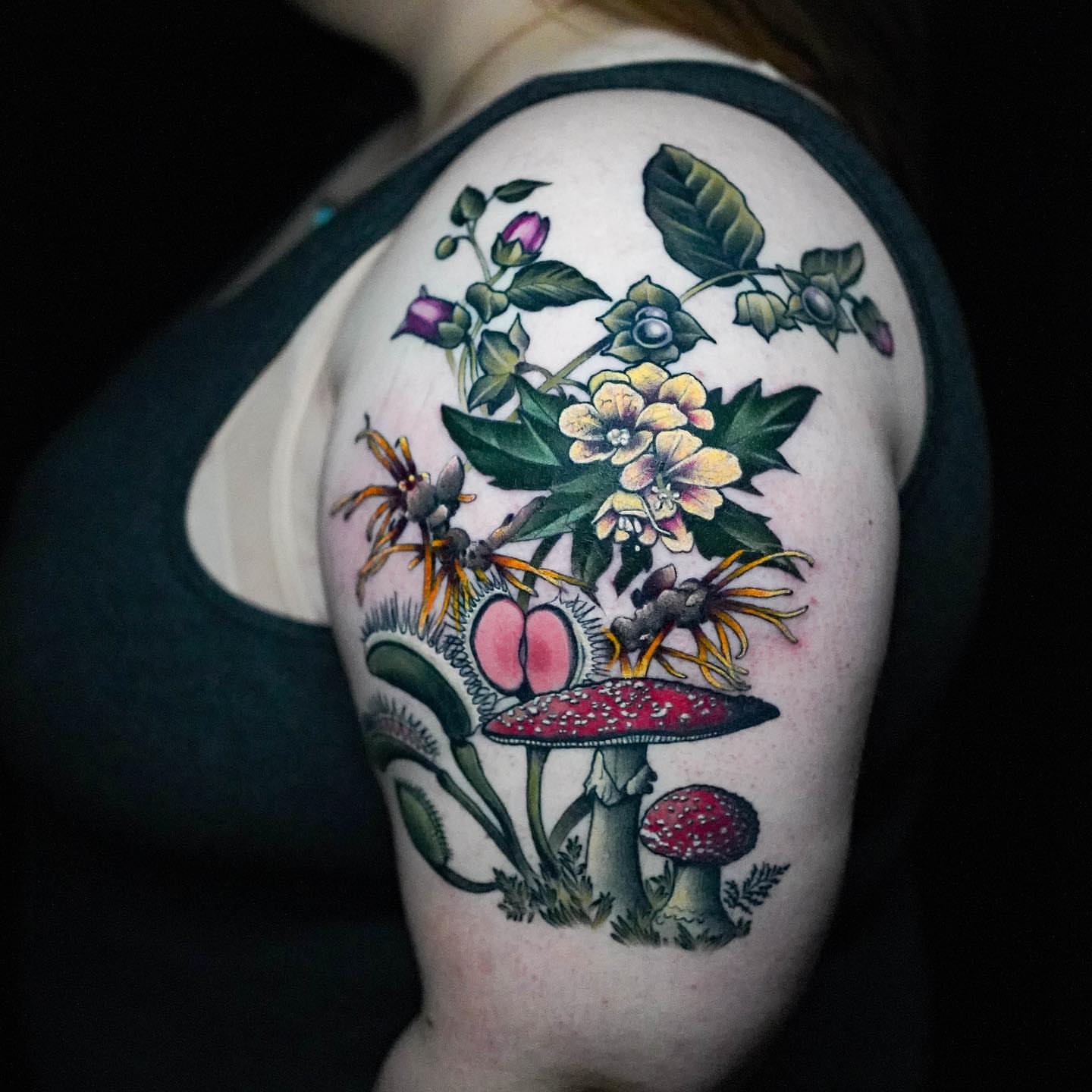 Mushroom and flowers American traditional tattoo on the shoulder by Danny Madsen