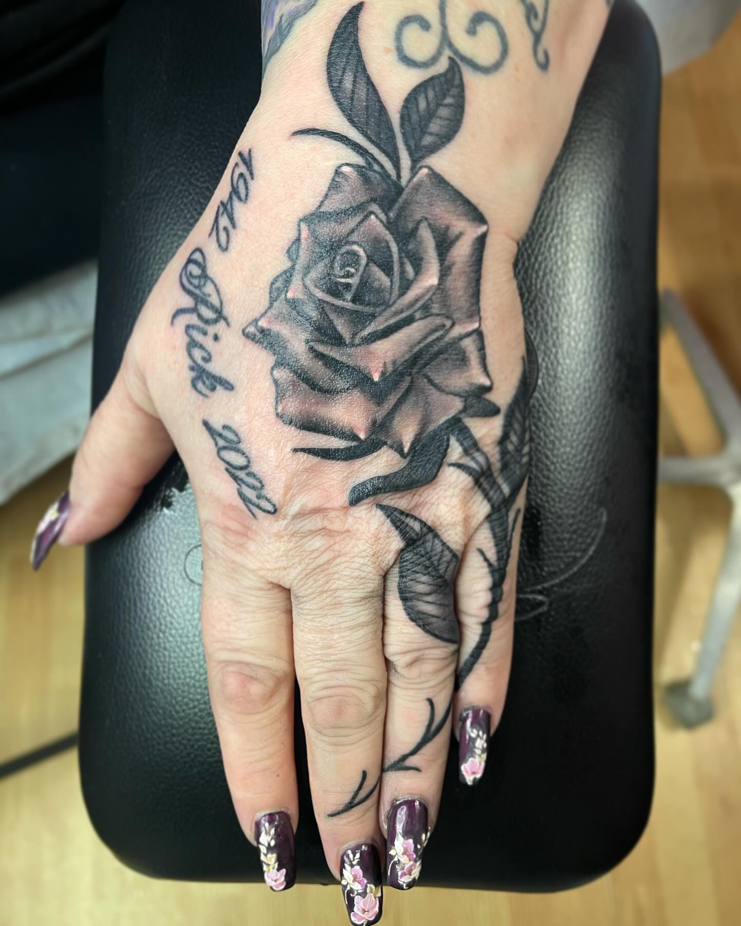 Rose black and grey tattoo on the hand by Yayo, New Britain, Connecticut