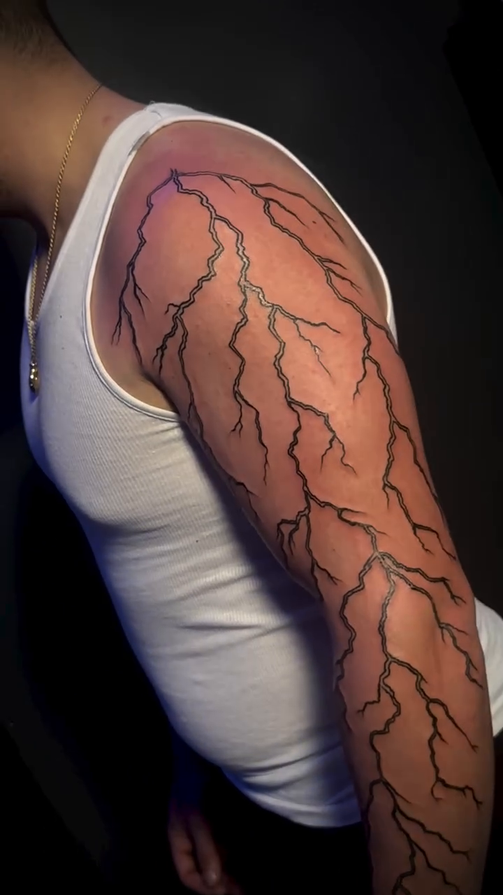 Lightning bolt realism tattoo by Paul burrows (Tatttoo Artist)