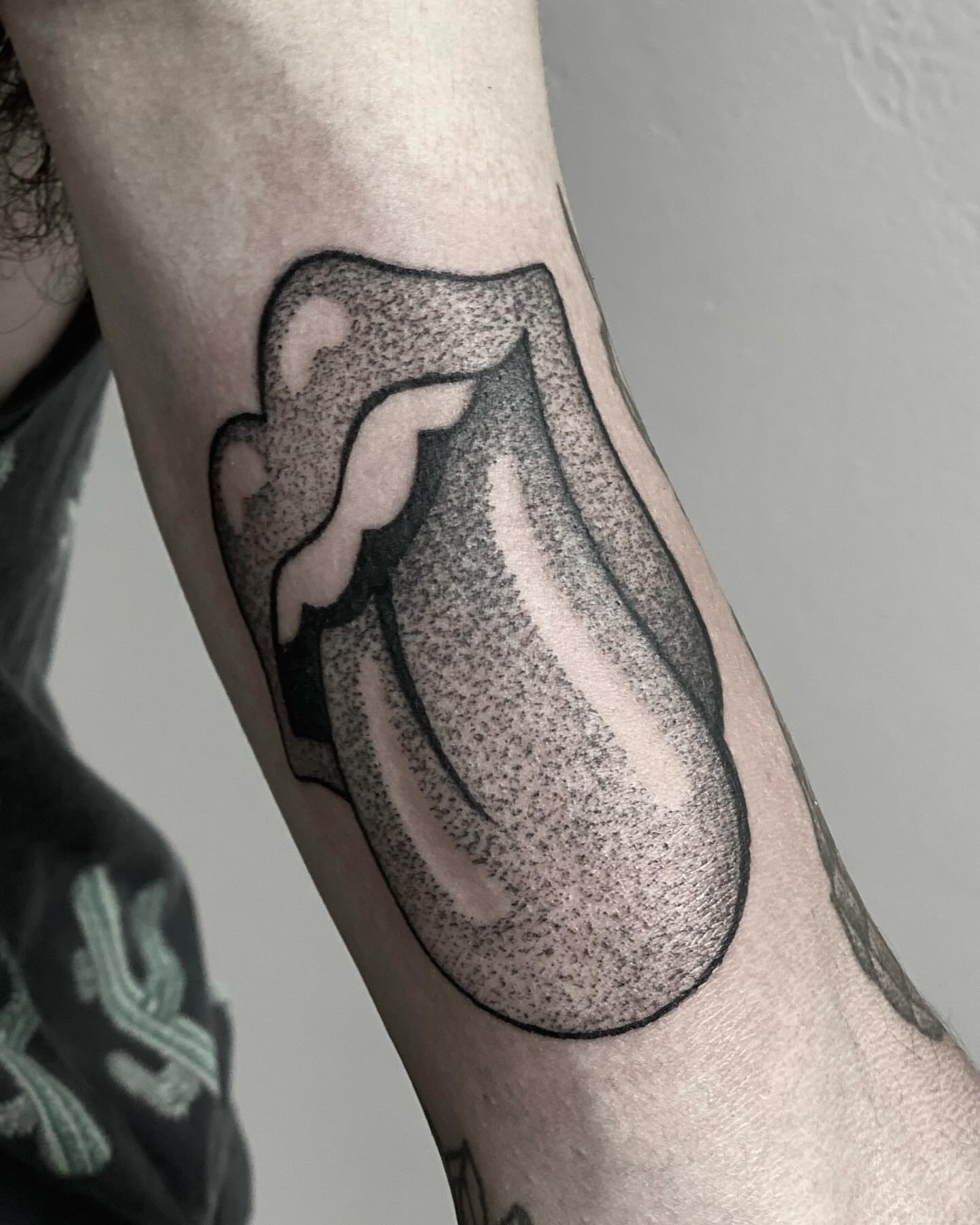 Dotwork tongue dotwork tattoo on the forearm by Alex Shakuto Tattoo