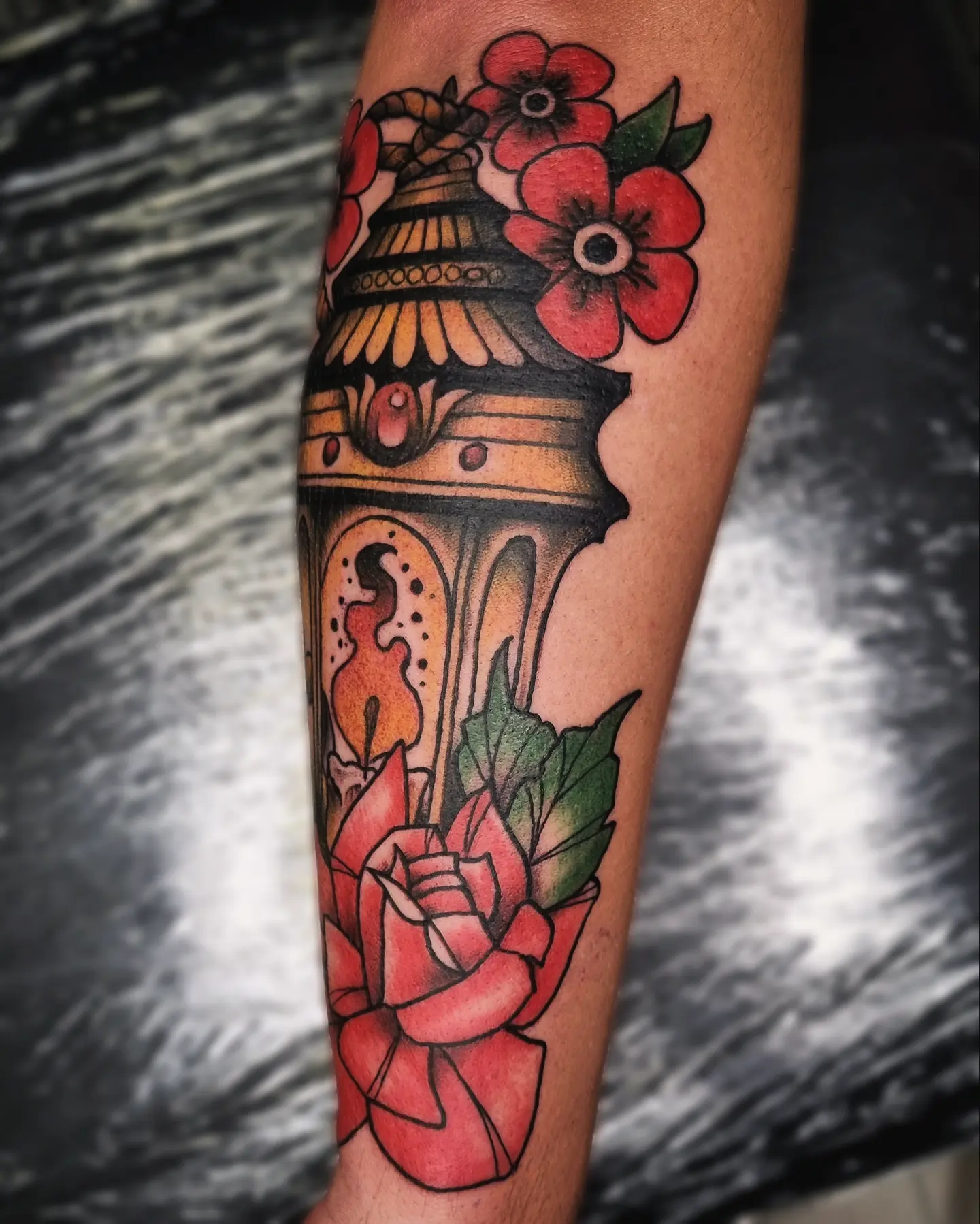 Lamp and flowers American traditional tattoo on the forearm by AntiheroTattoo