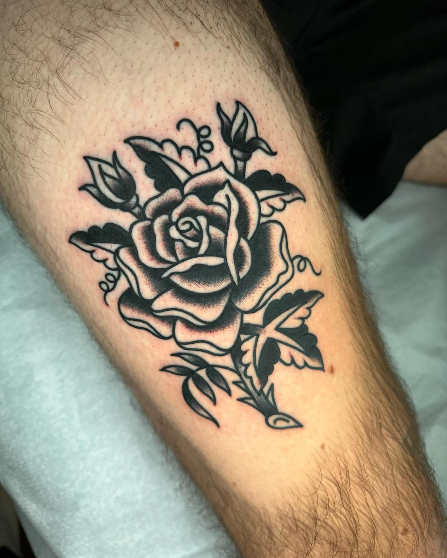 Rose black and grey tattoo on the forearm by James Shepherd, Austin, Texas