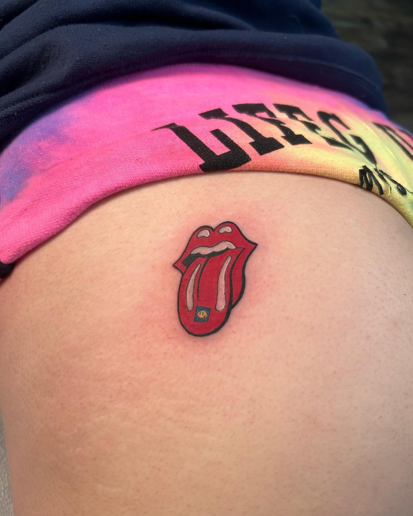 Rolling stones tongue new school tattoo on the shoulder by Cameron 🩸👻