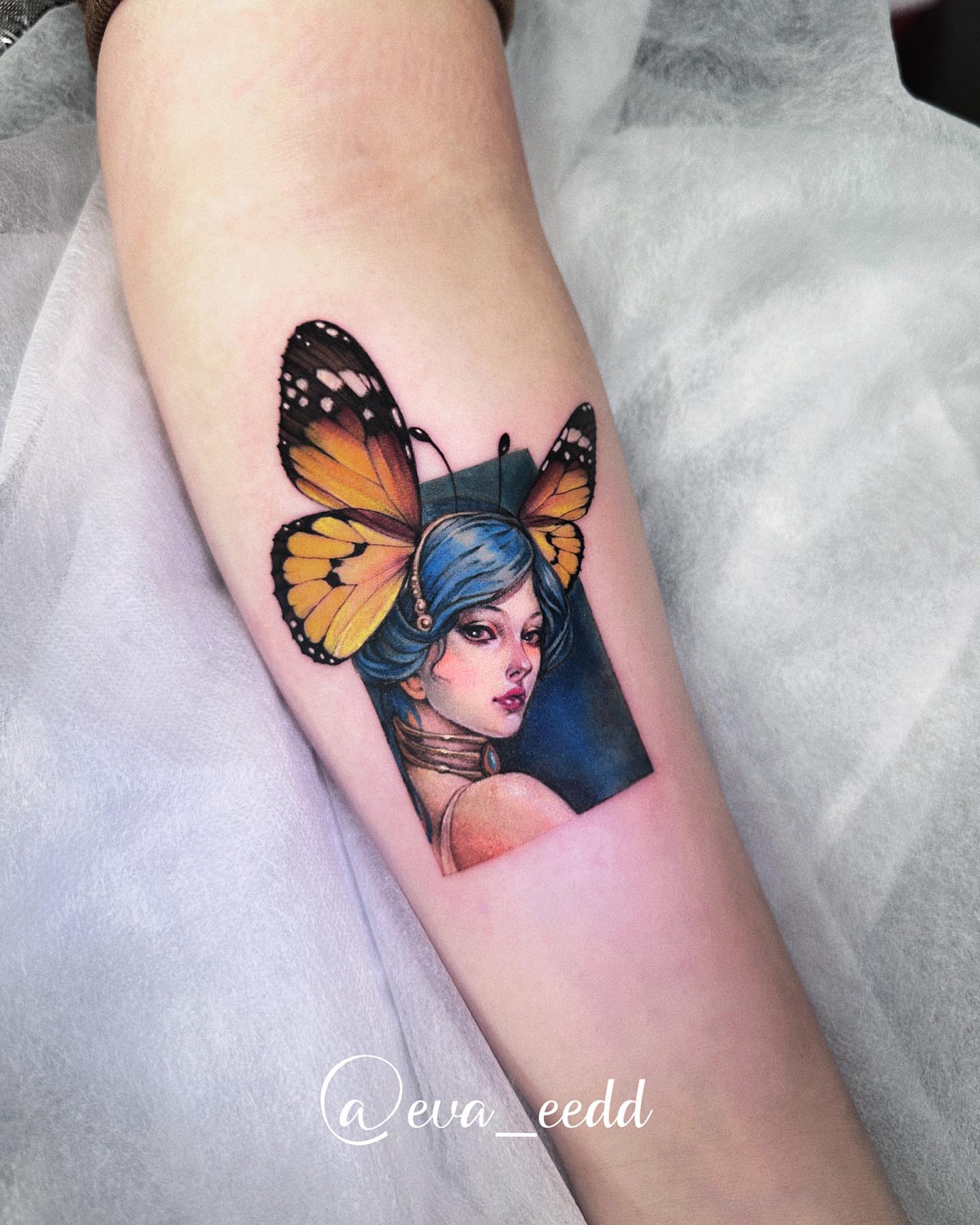 Butterfly and woman realism tattoo on the forearm by Eva Liu