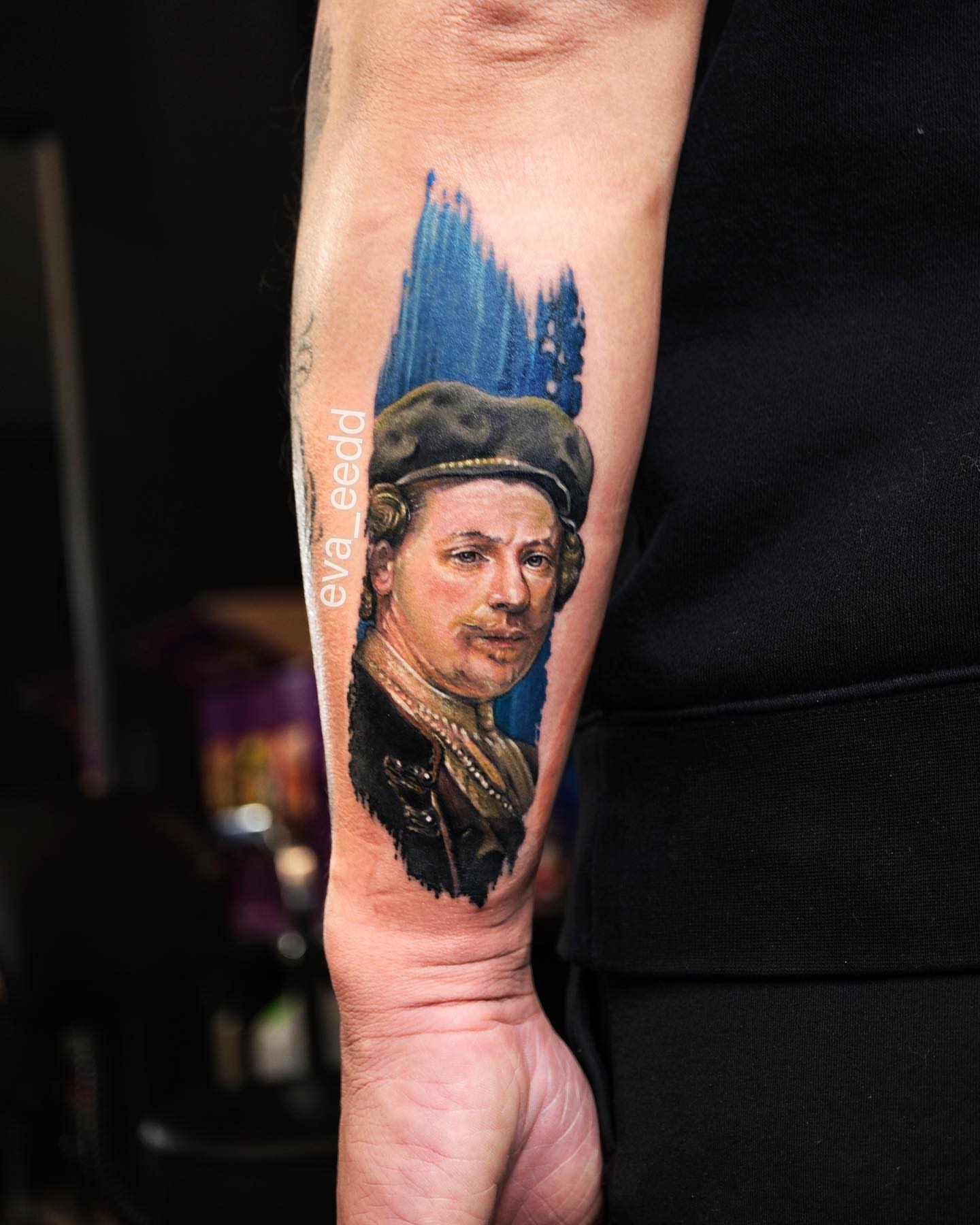 Portrait realism tattoo on the forearm by Eva Liu
