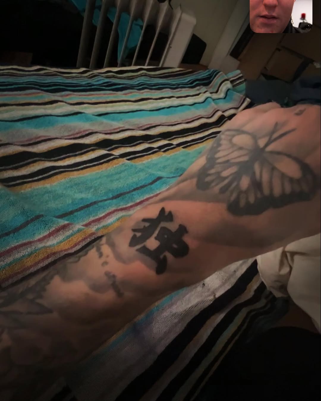 Butterfly and kanji realism tattoo on the forearm by Silky Inks NJ 201, North Haledon, New Jersey
