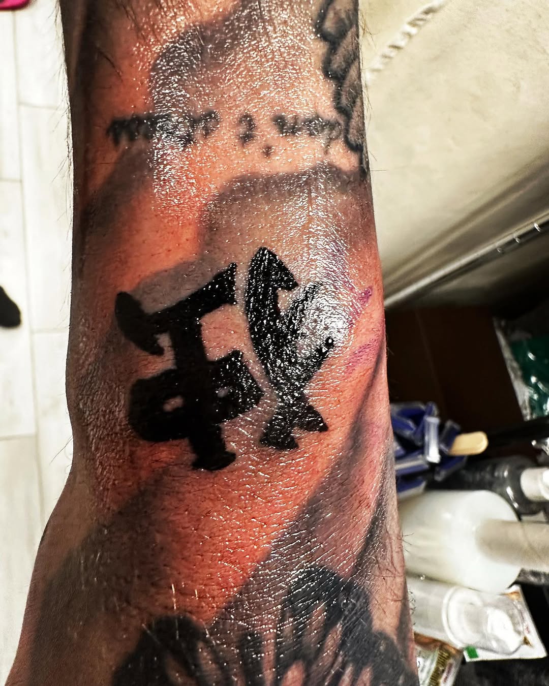 Stylized characters cyber sigilism tattoo on the forearm by Silky Inks NJ 201, North Haledon, New Jersey