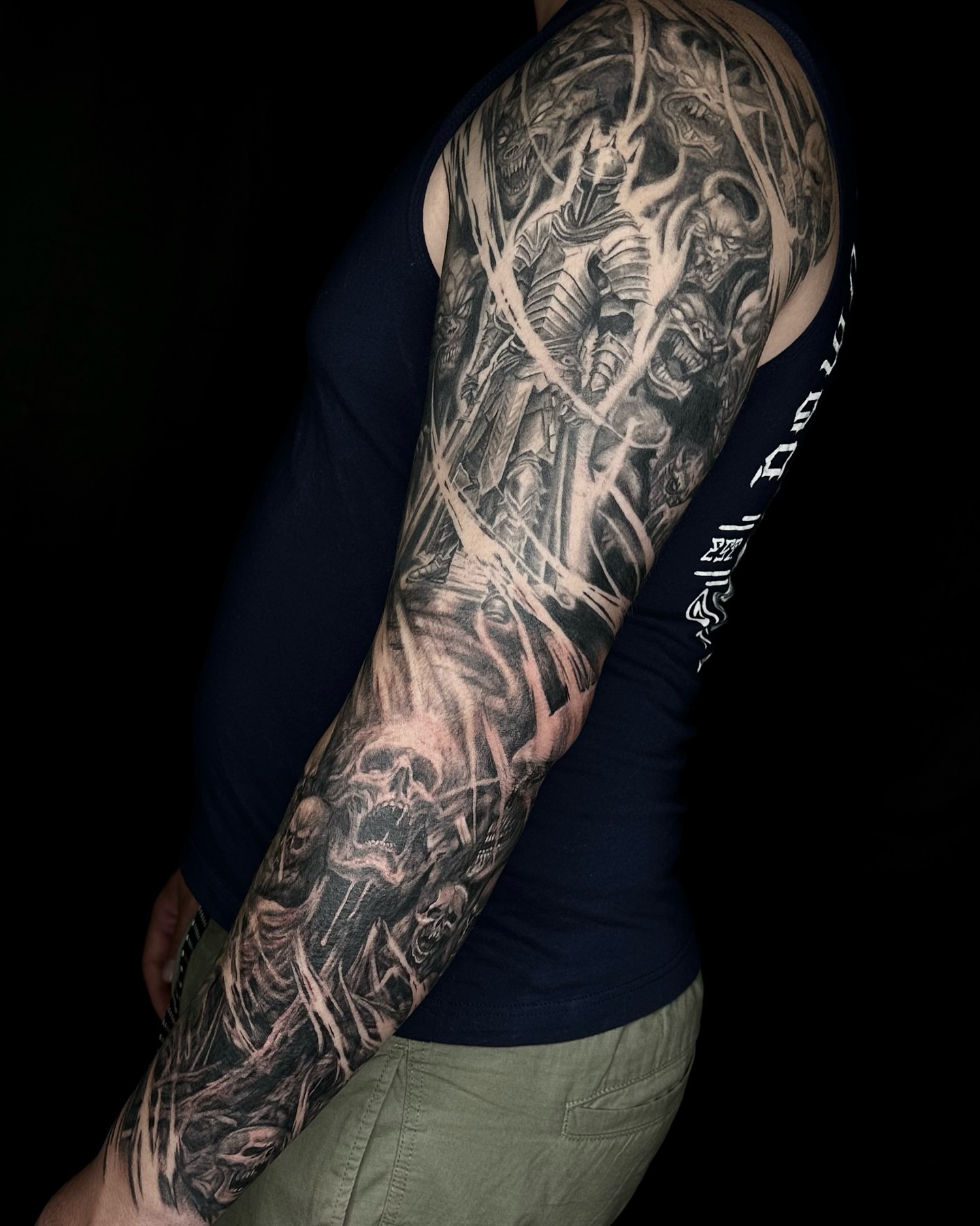 Warrior and skull realism tattoo on the upper arm by Alia